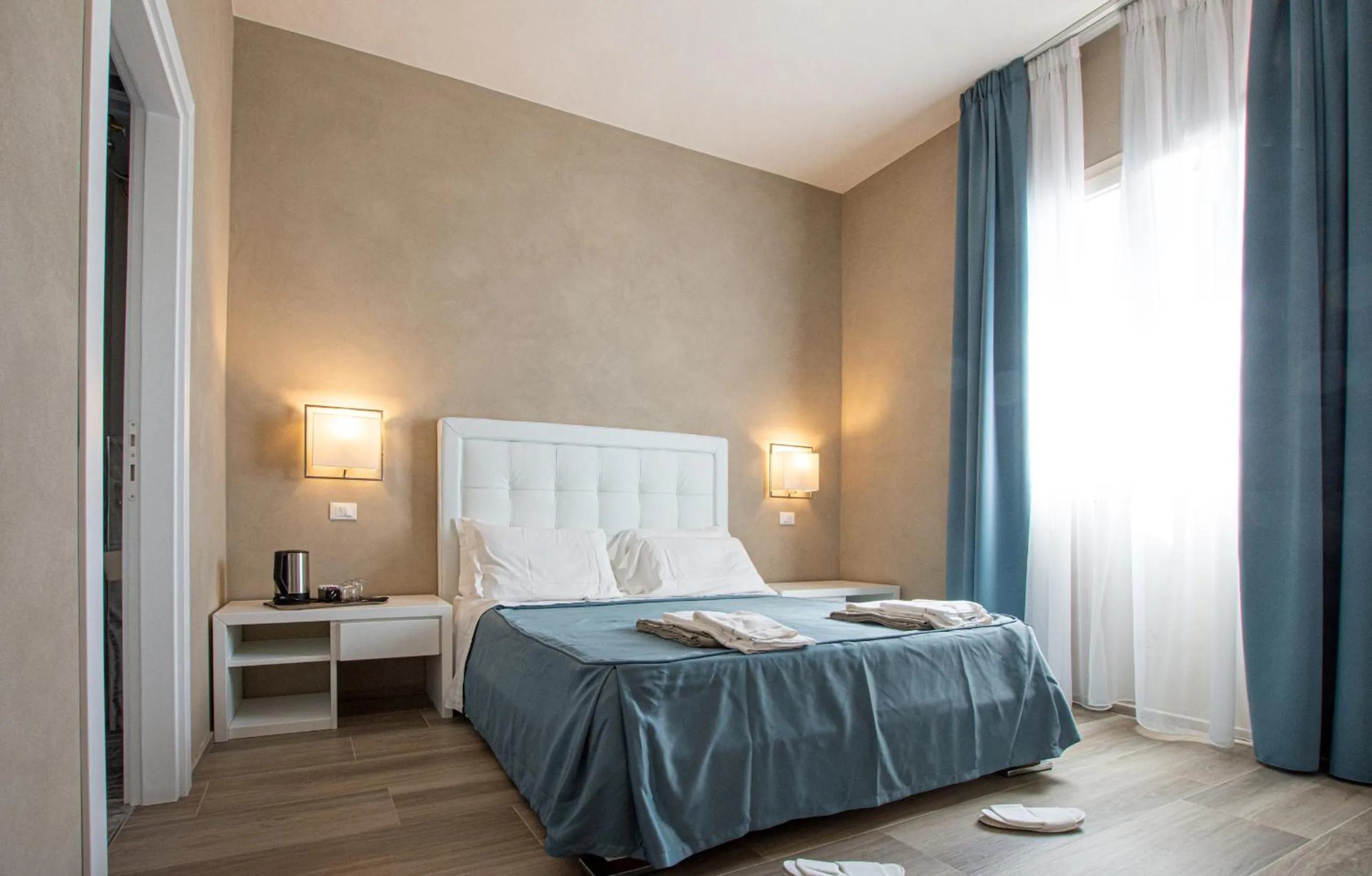 Bed in Hotel Cecina Beach