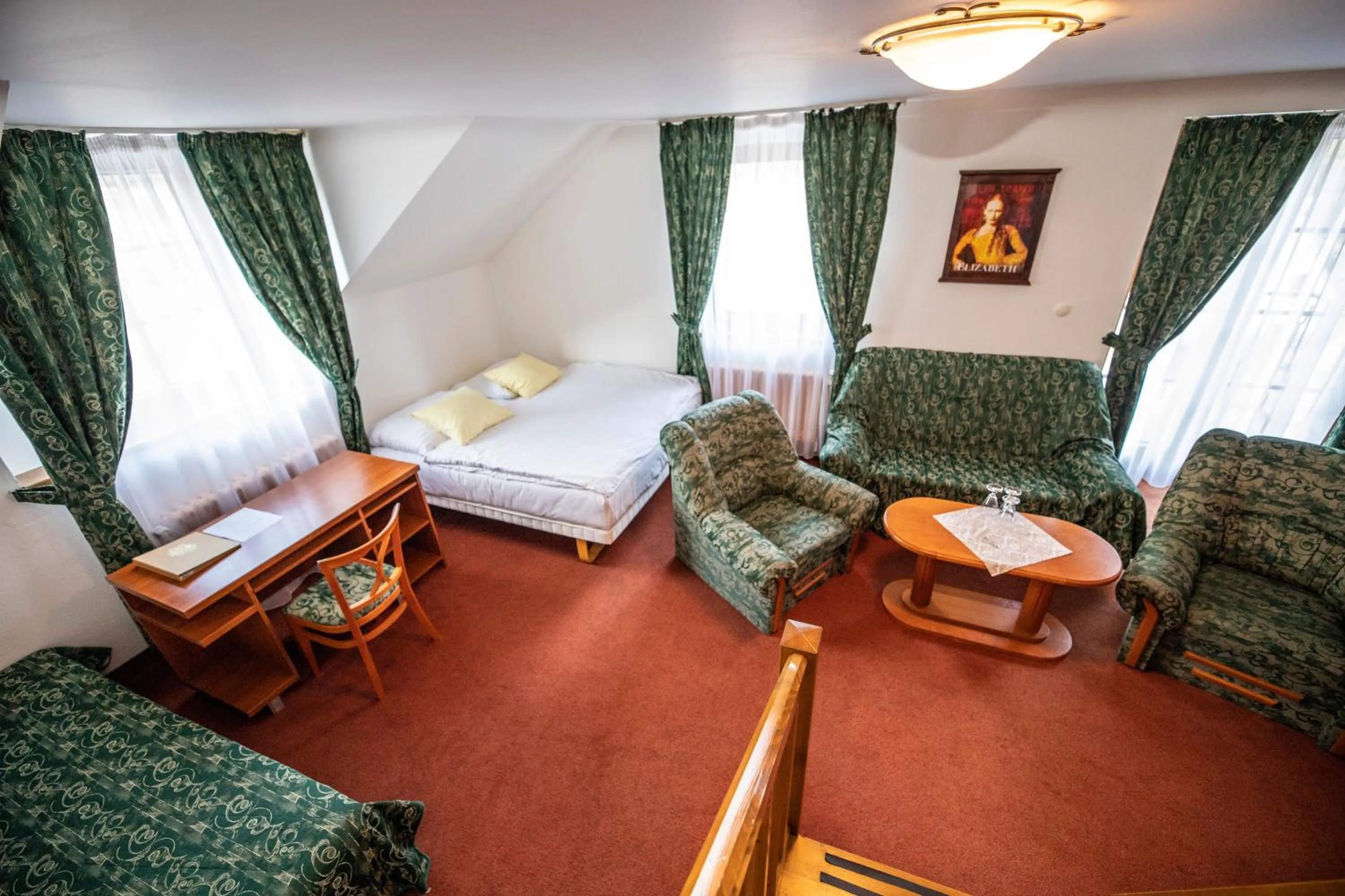 Living room, Bed in ROMANTIK HOTEL ELEONORA