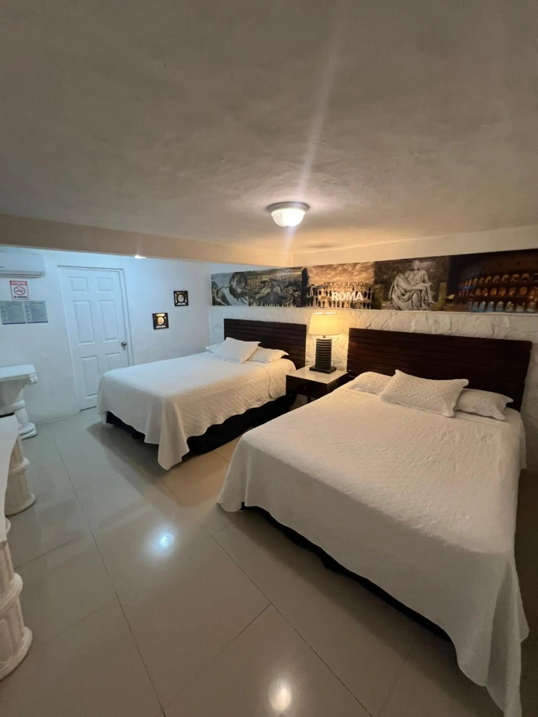 Quadruple Room with Terrace - single occupancy in VILLA NAPOLI Quadruple Room with Terrace - single occupancy in VILLA NAPOLI