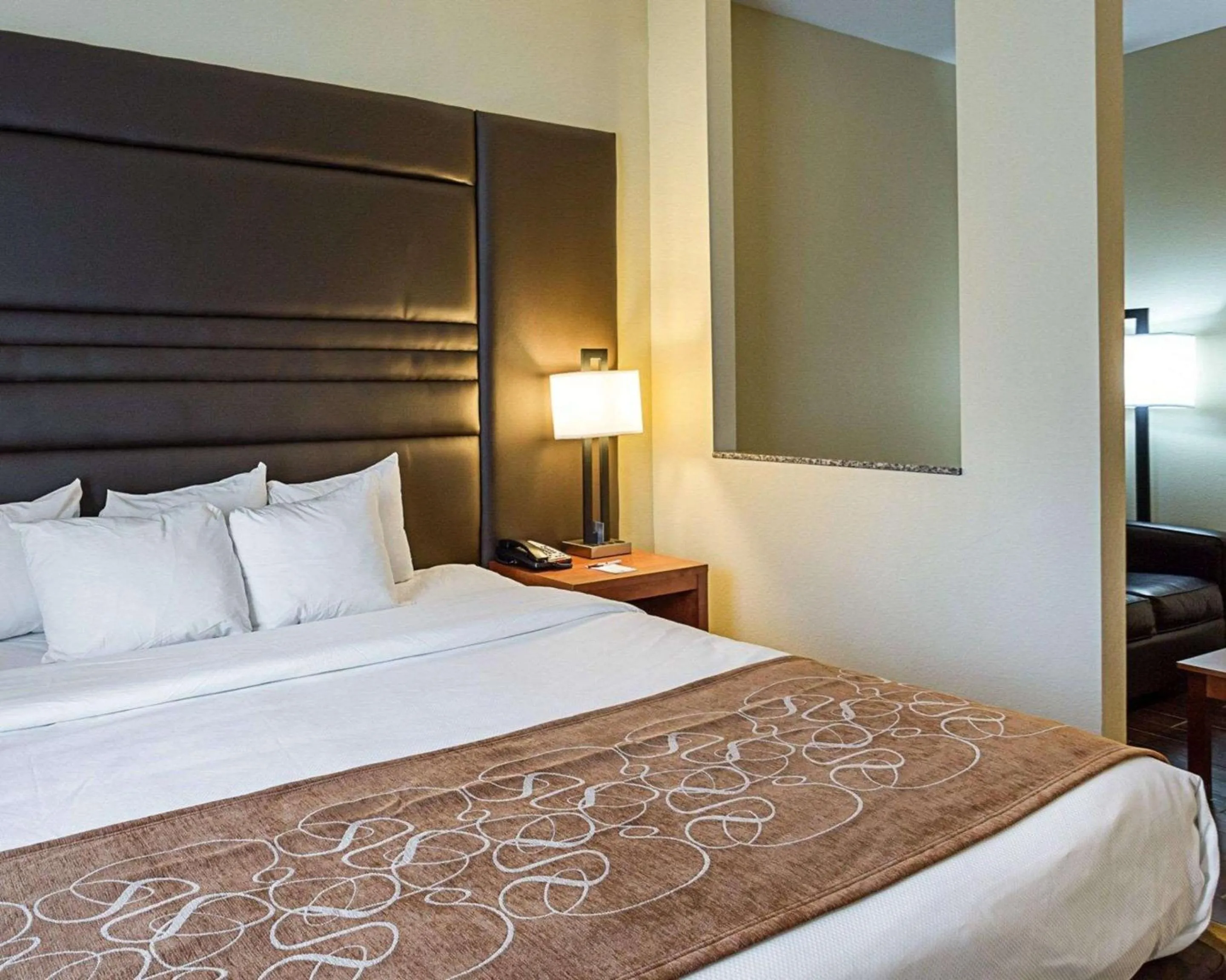 Bedroom, Bed in Comfort Suites near Tanger Outlet Mall