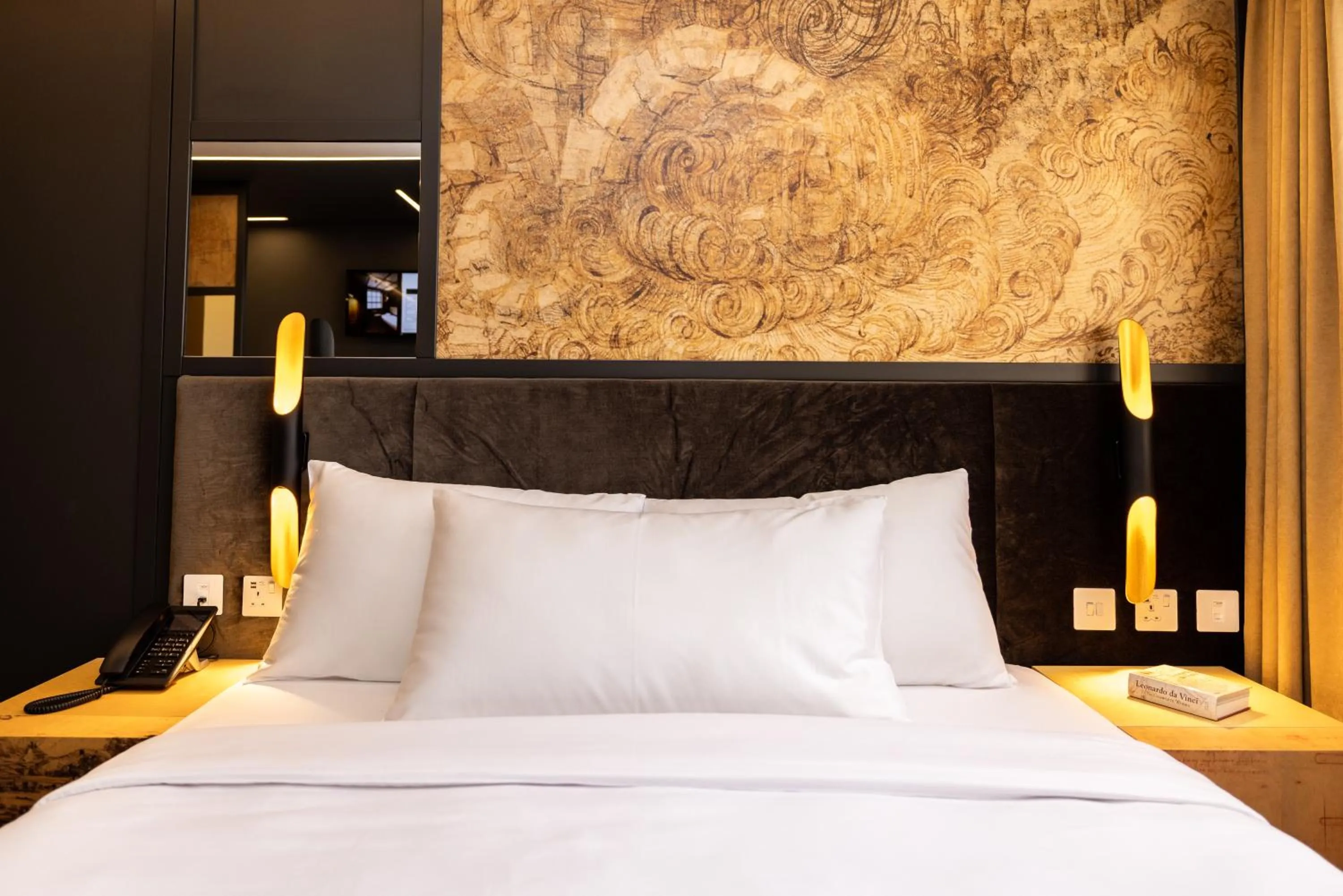 Bed in Limehouse Library Hotel