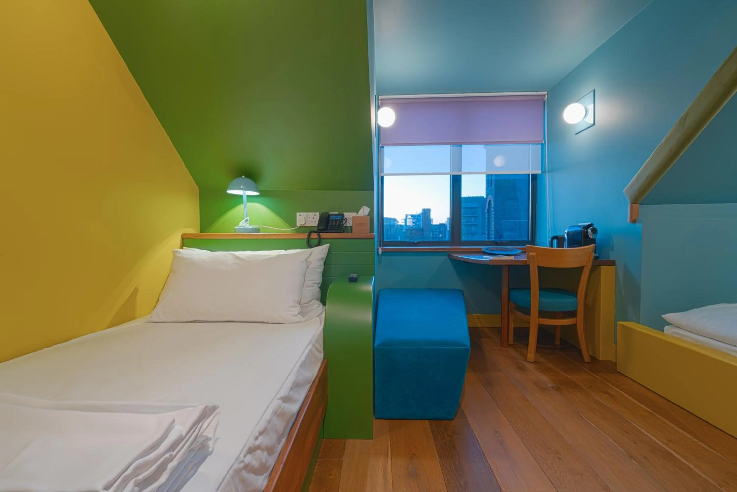 Bed in Limehouse Library Hotel