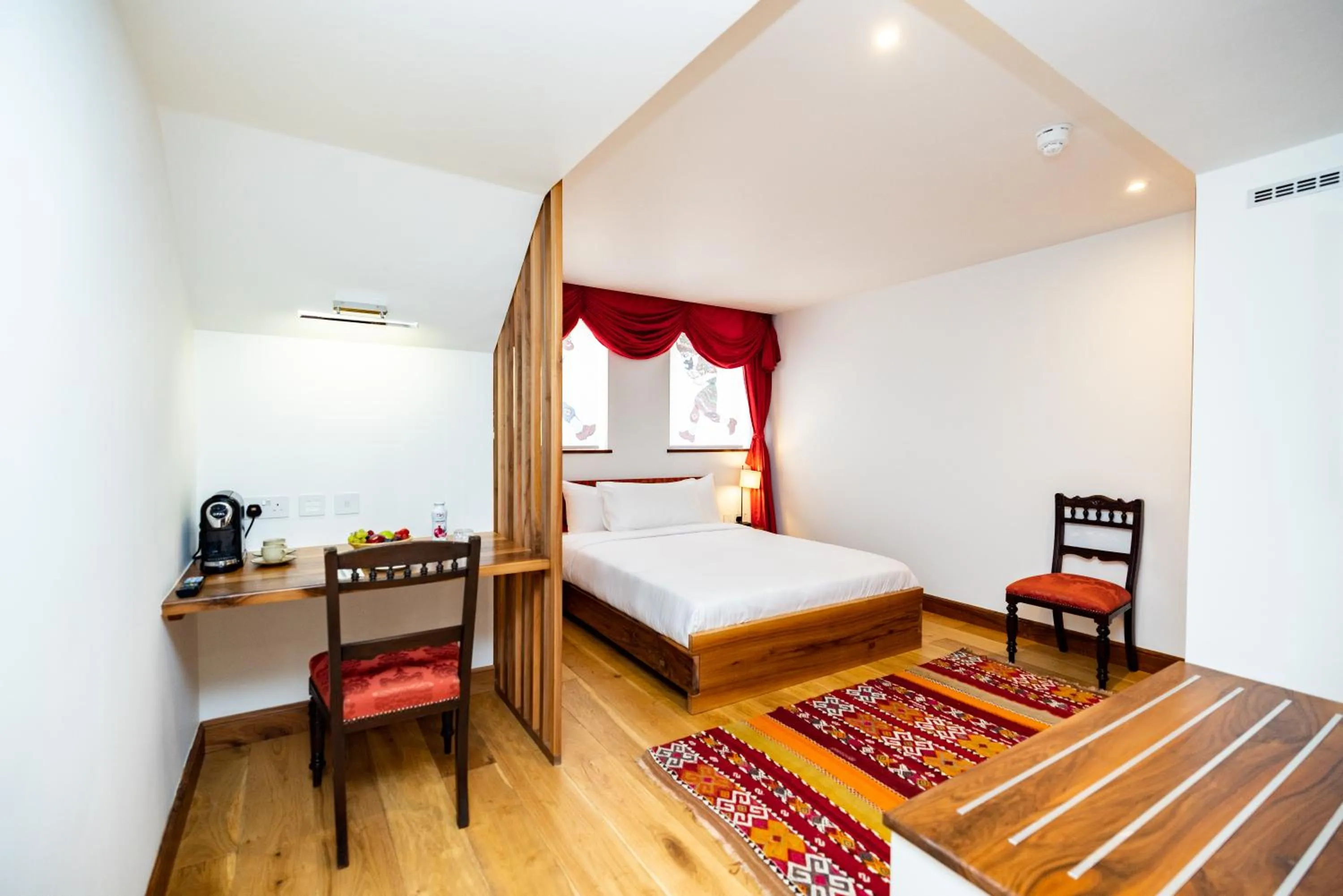 Bed in Limehouse Library Hotel