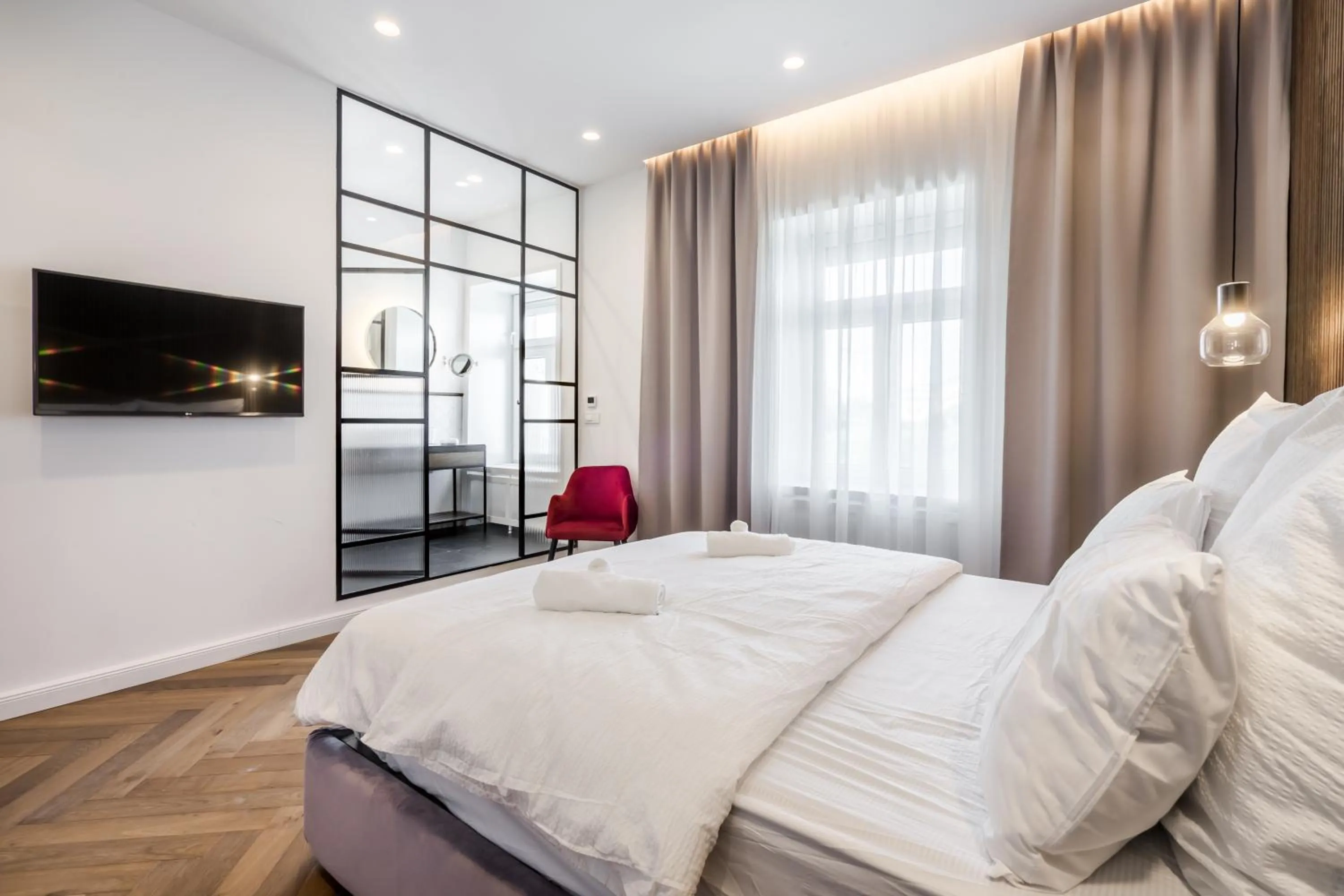 Photo of the whole room, Bed in Budapest Eye- Boutique Suites, by BQA