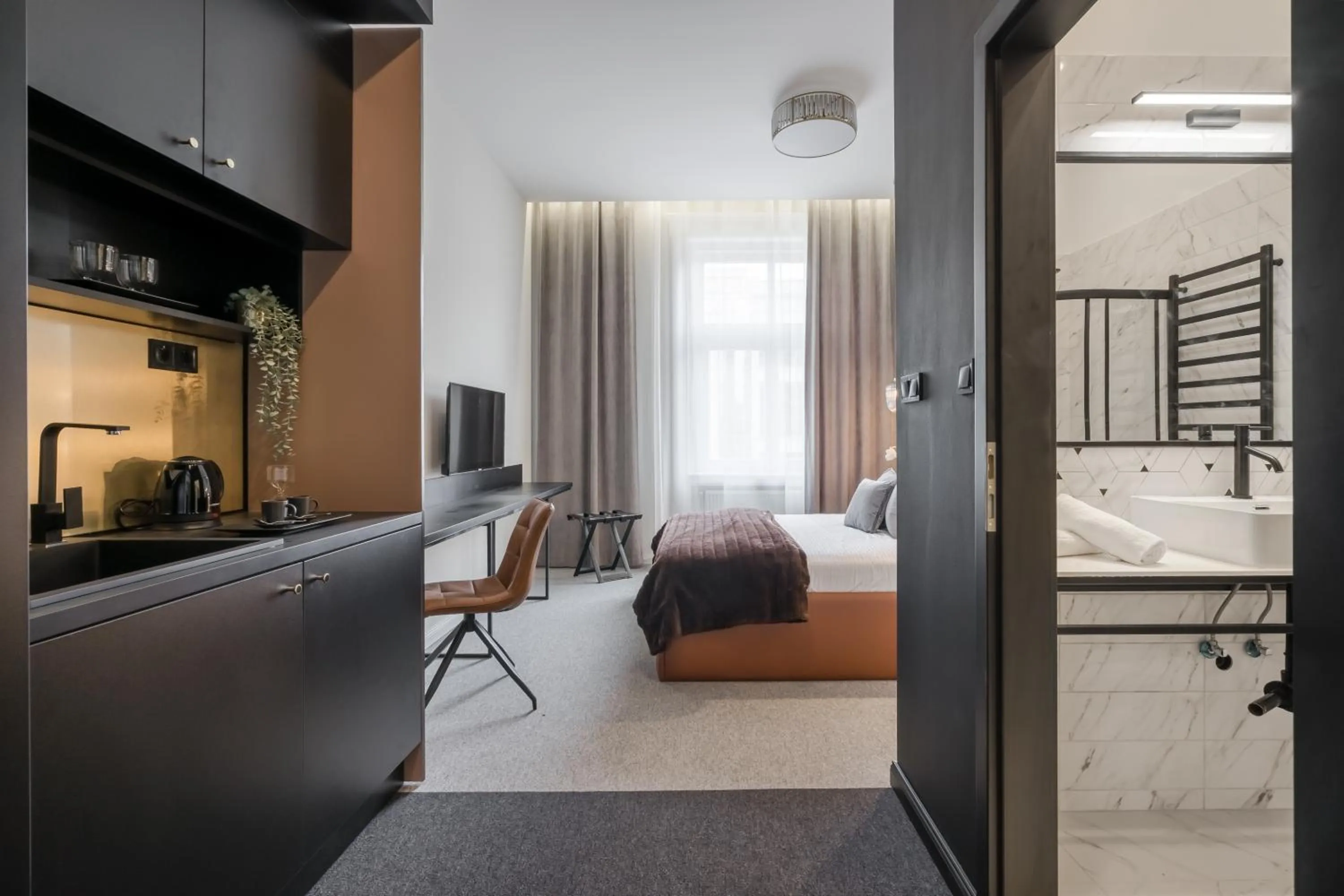 Photo of the whole room, Bed in Astoria Boutique Suites- Best Location by BQA