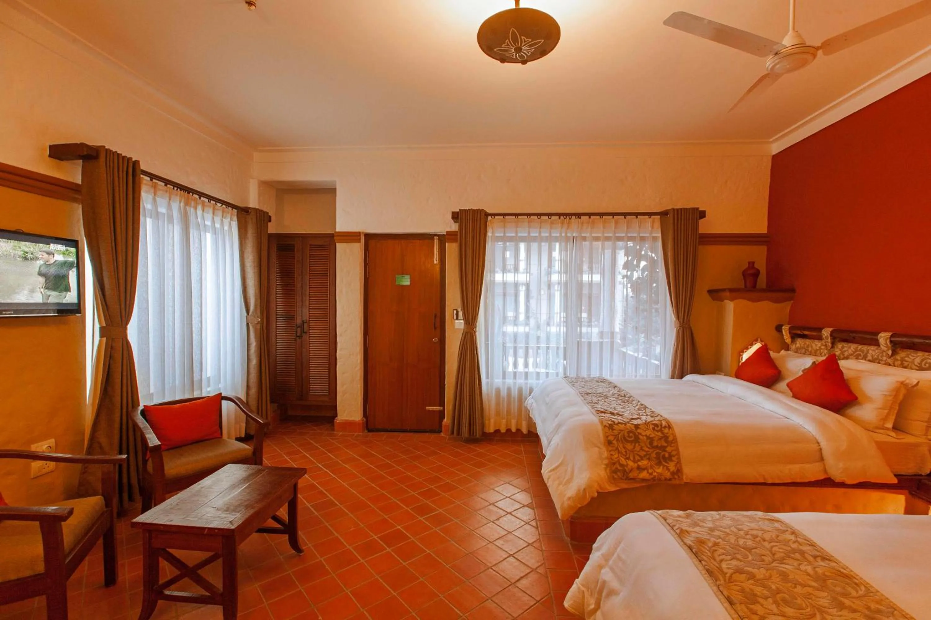 Photo of the whole room, Bed in Green Park Chitwan