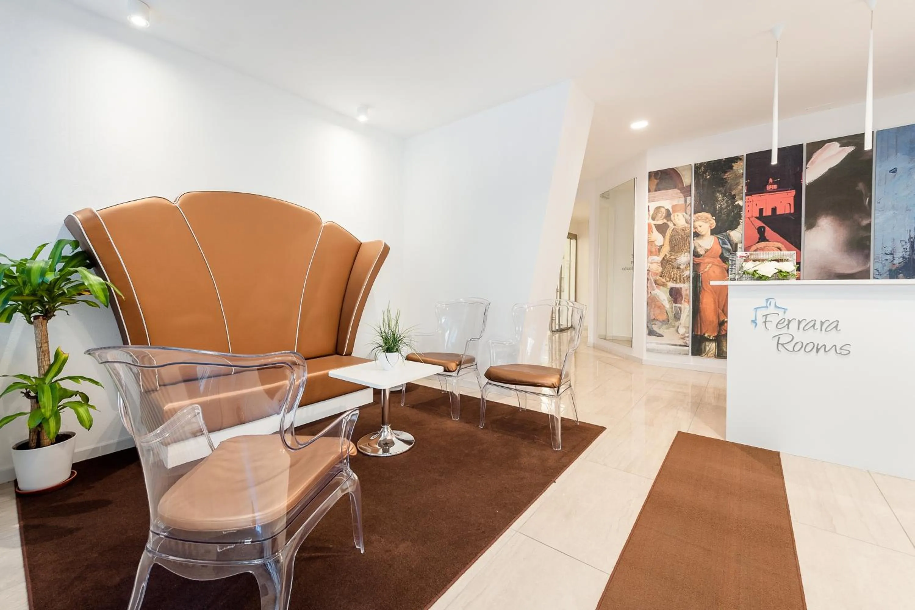 Communal lounge/ TV room in Ferrara Rooms