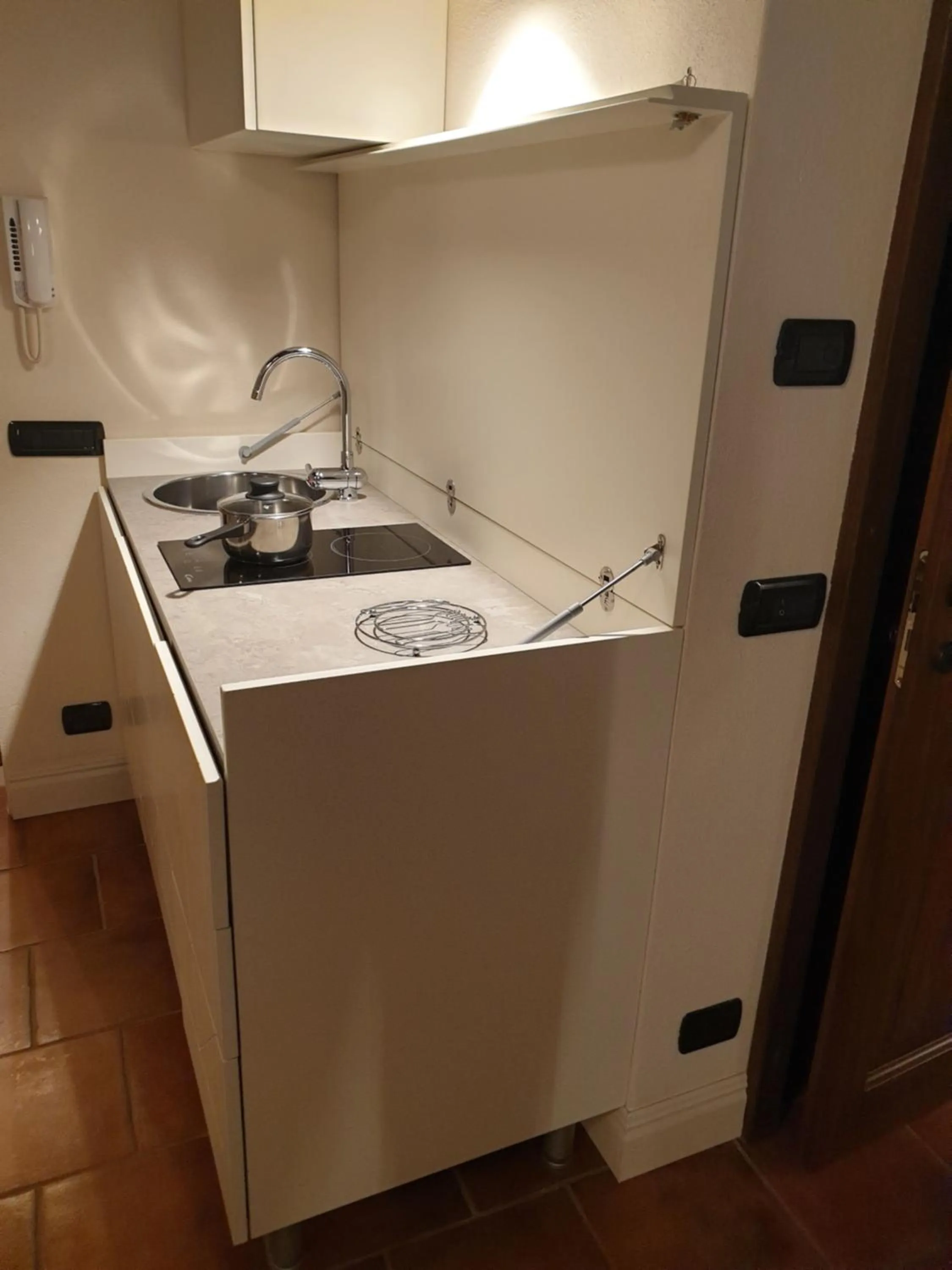 Kitchen or kitchenette in Ferrara Rooms