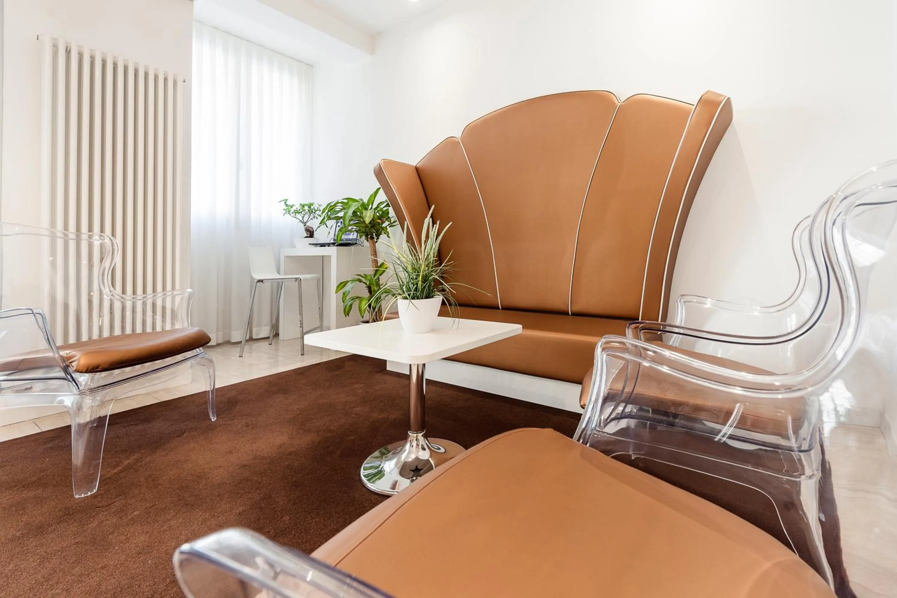 Communal lounge/ TV room in Ferrara Rooms