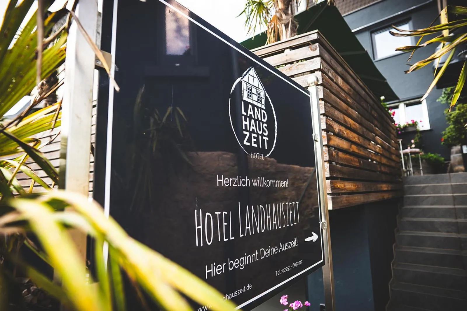 Property logo or sign in Boutique Hotel LANDHAUSZEIT