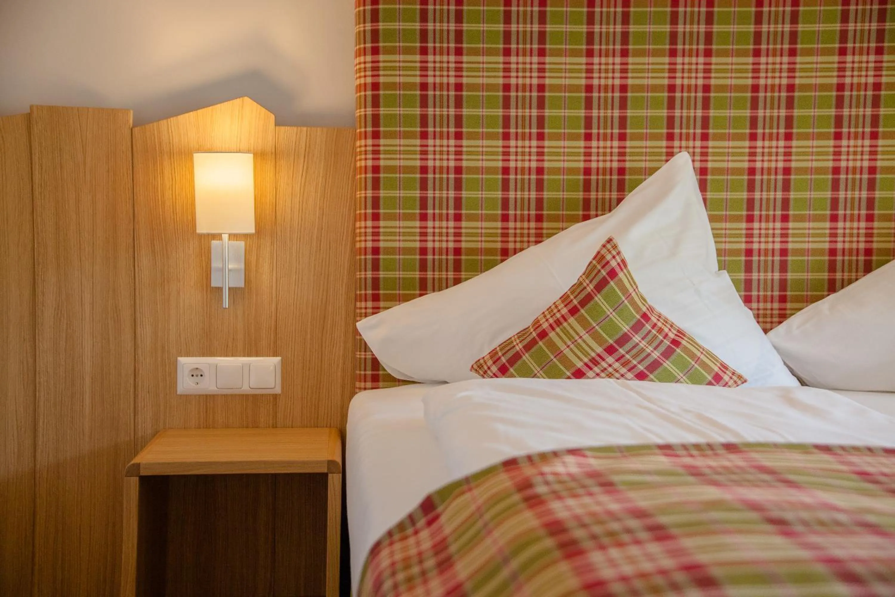 Decorative detail, Bed in Evident Hotel Prägant 4-Superior