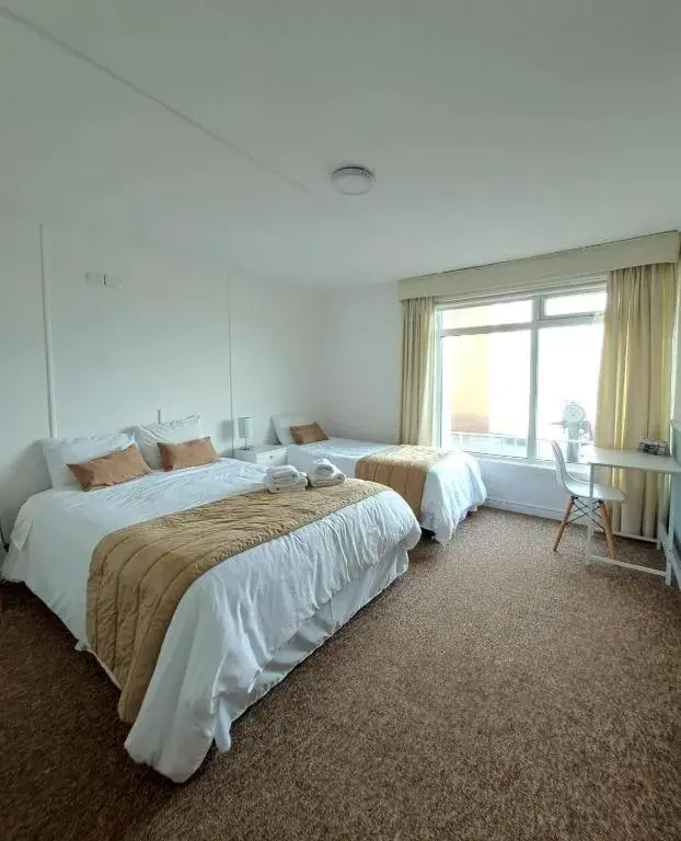 Standard Triple Room in Hotel Capitán Eberhard Standard Triple Room in Hotel Capitán Eberhard