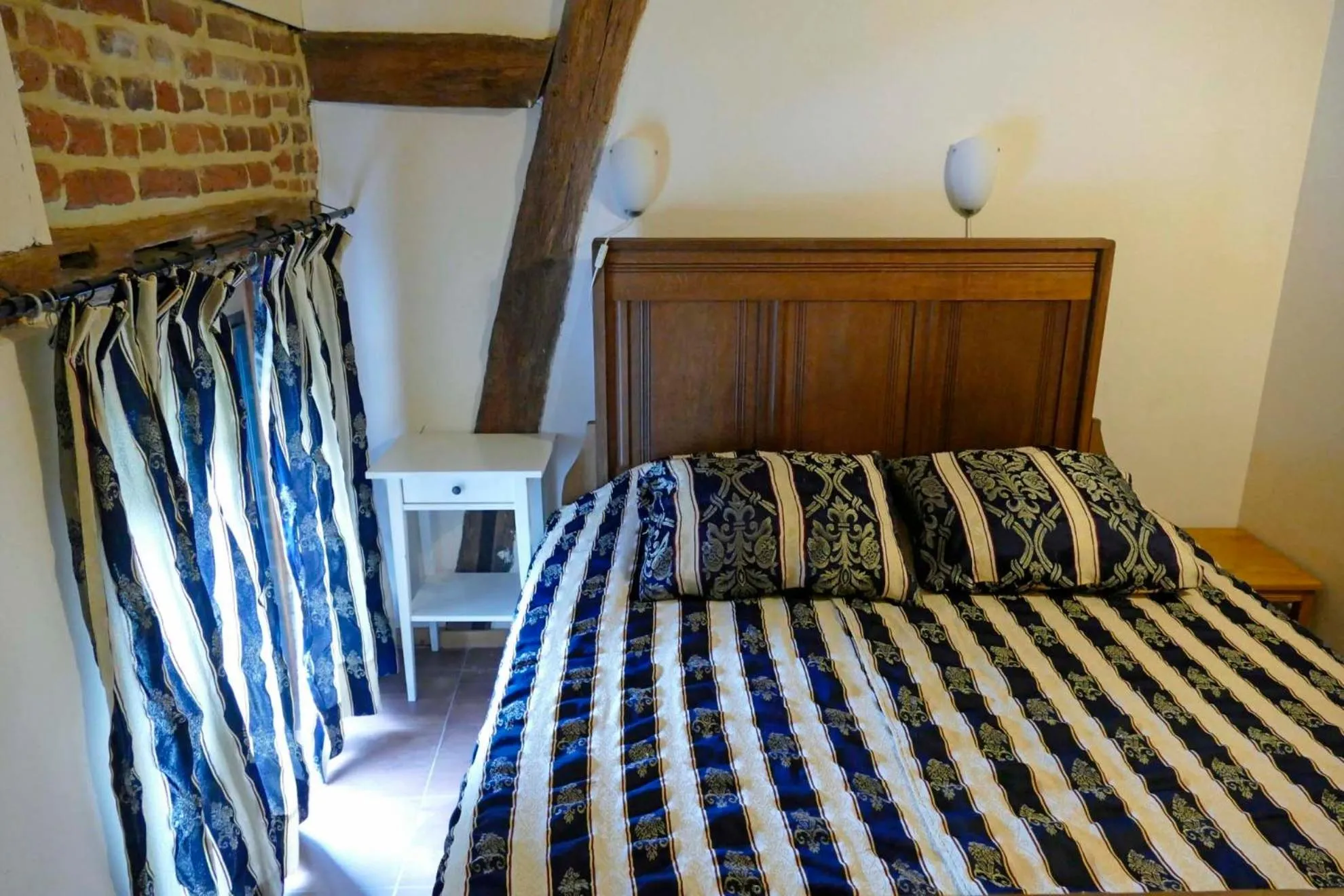 Bed in Apartments Cour d'Aix