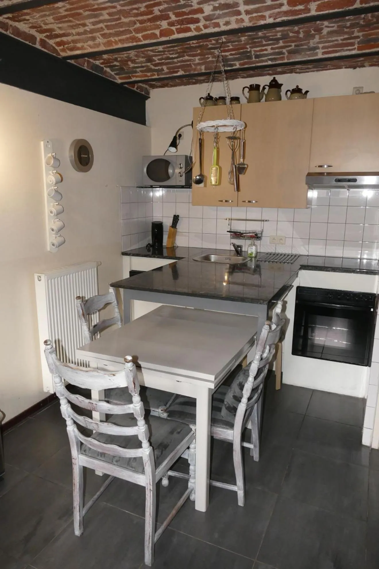 Kitchen or kitchenette in Apartments Cour d'Aix