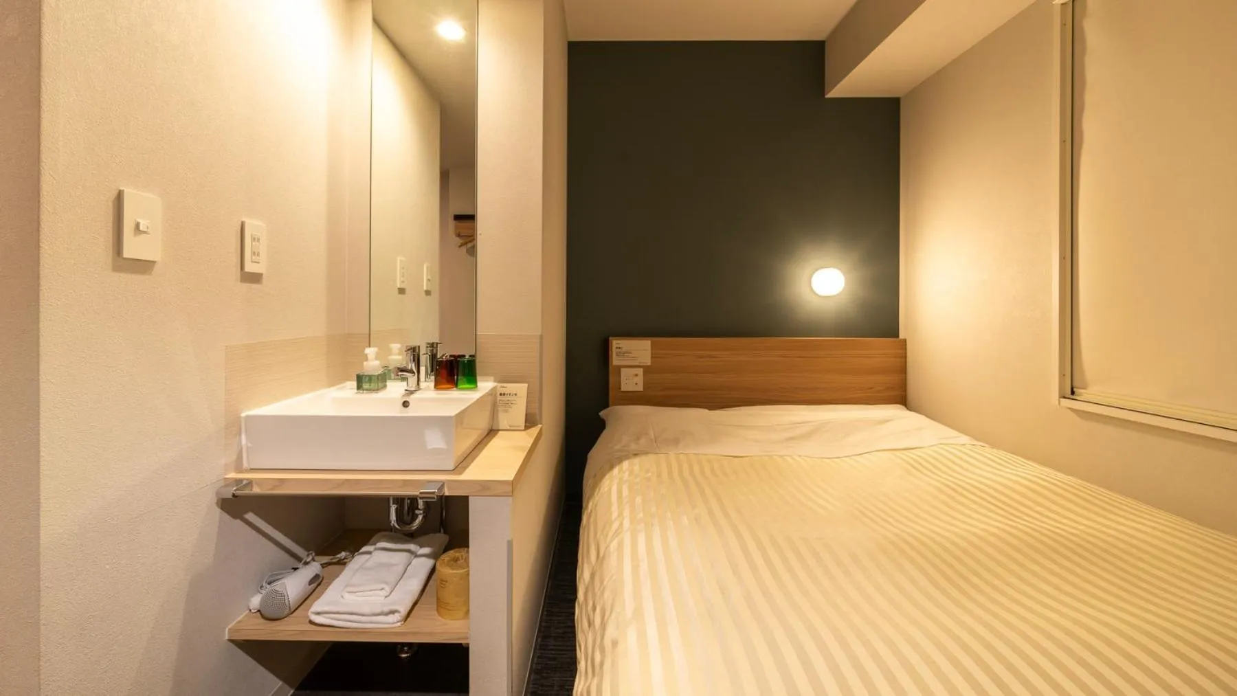 Bed in Super Hotel Fujikawaguchiko Tennenonsen