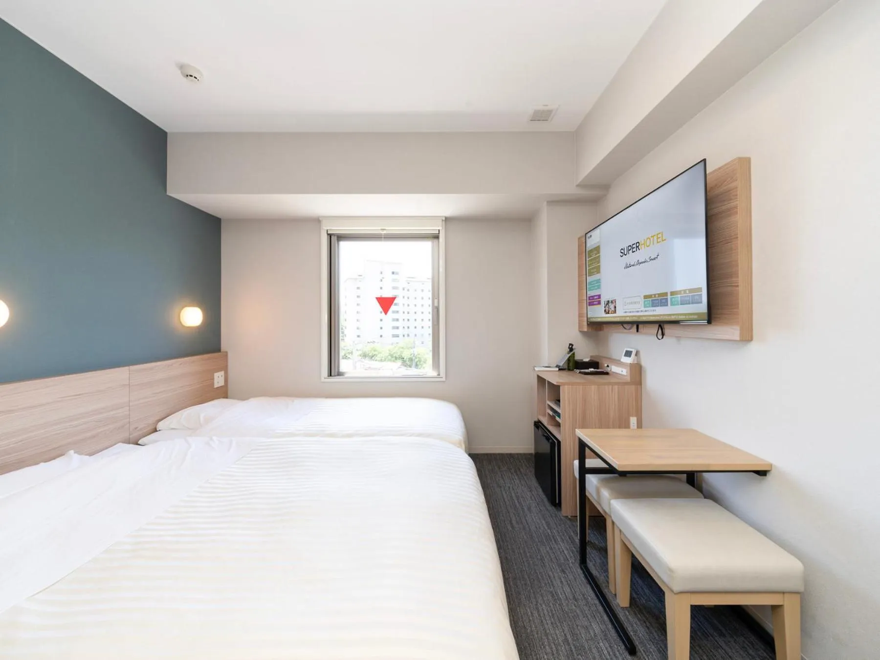 Bed in Super Hotel Fujikawaguchiko Tennenonsen