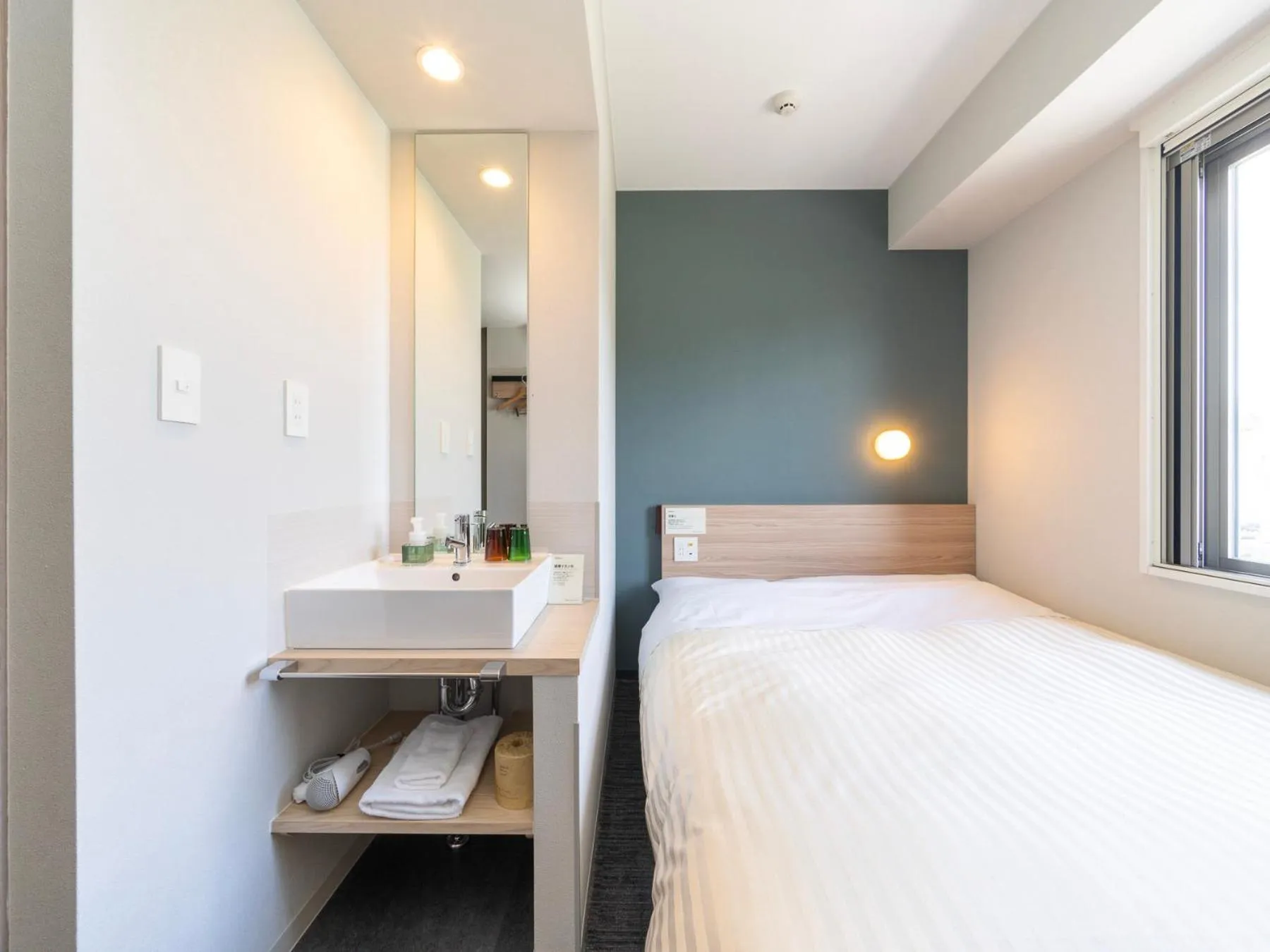 Bed in Super Hotel Fujikawaguchiko Tennenonsen