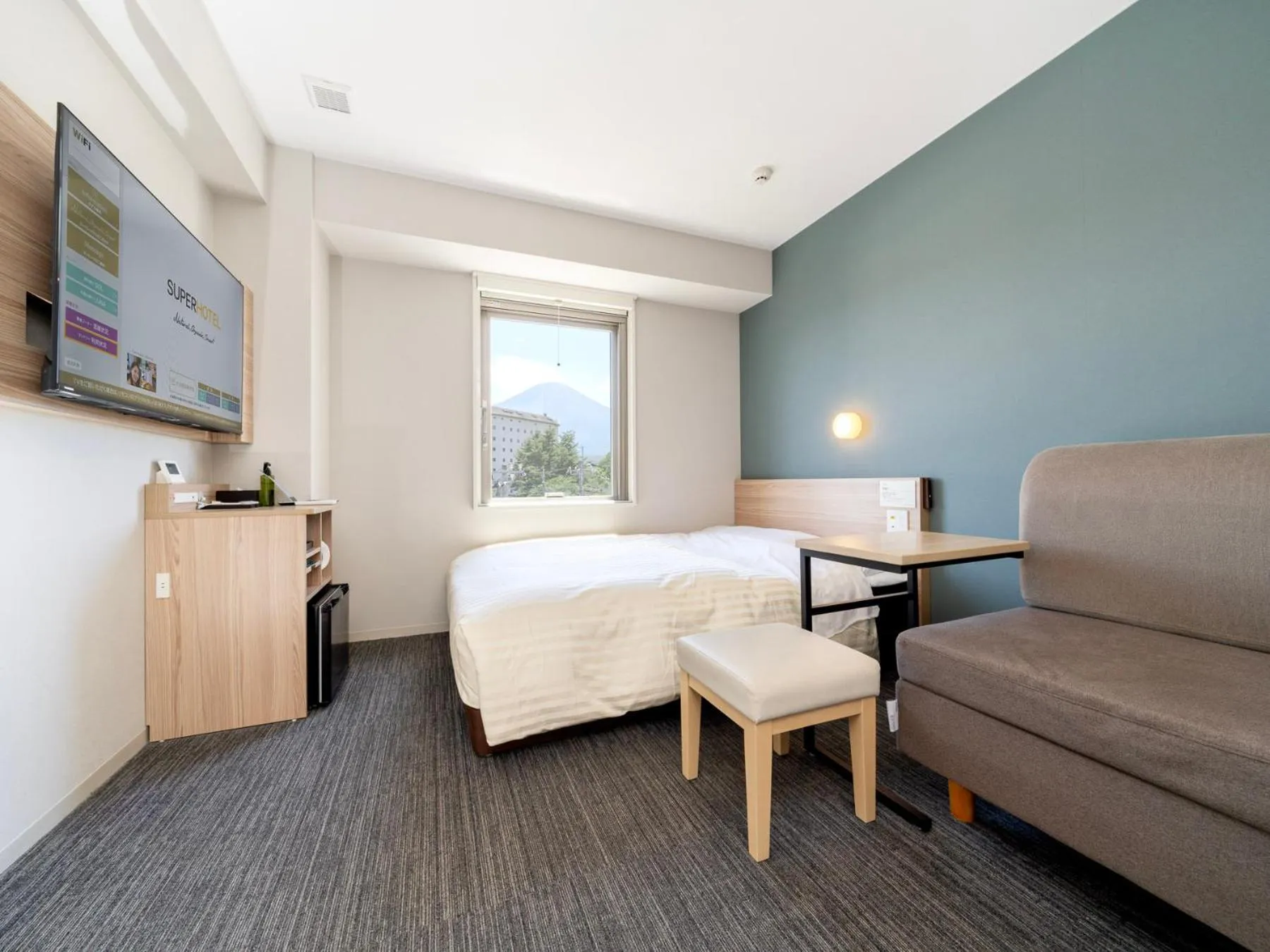 Bed in Super Hotel Fujikawaguchiko Tennenonsen