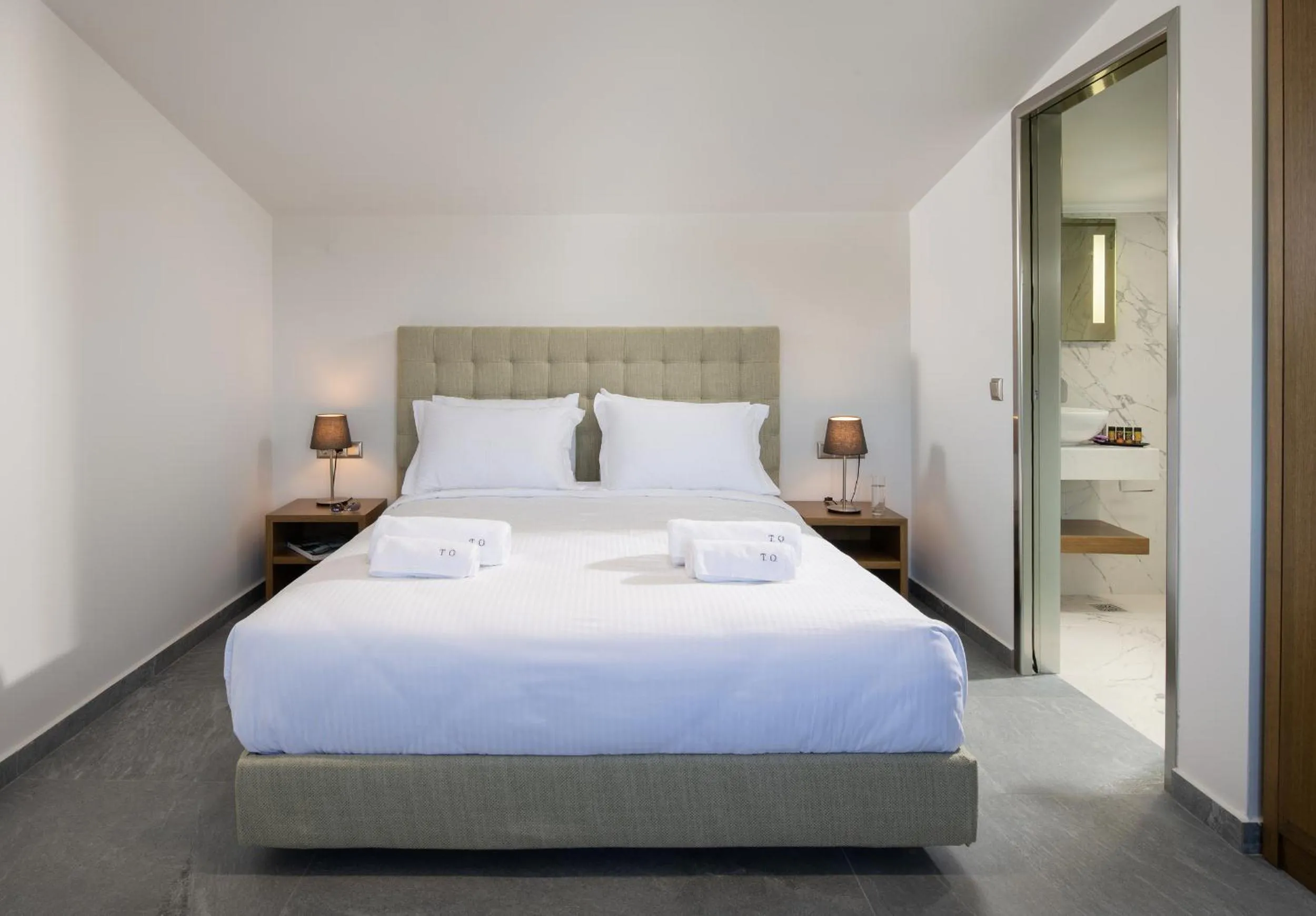 Bed in Terra Olivia Luxury Villas and Suites