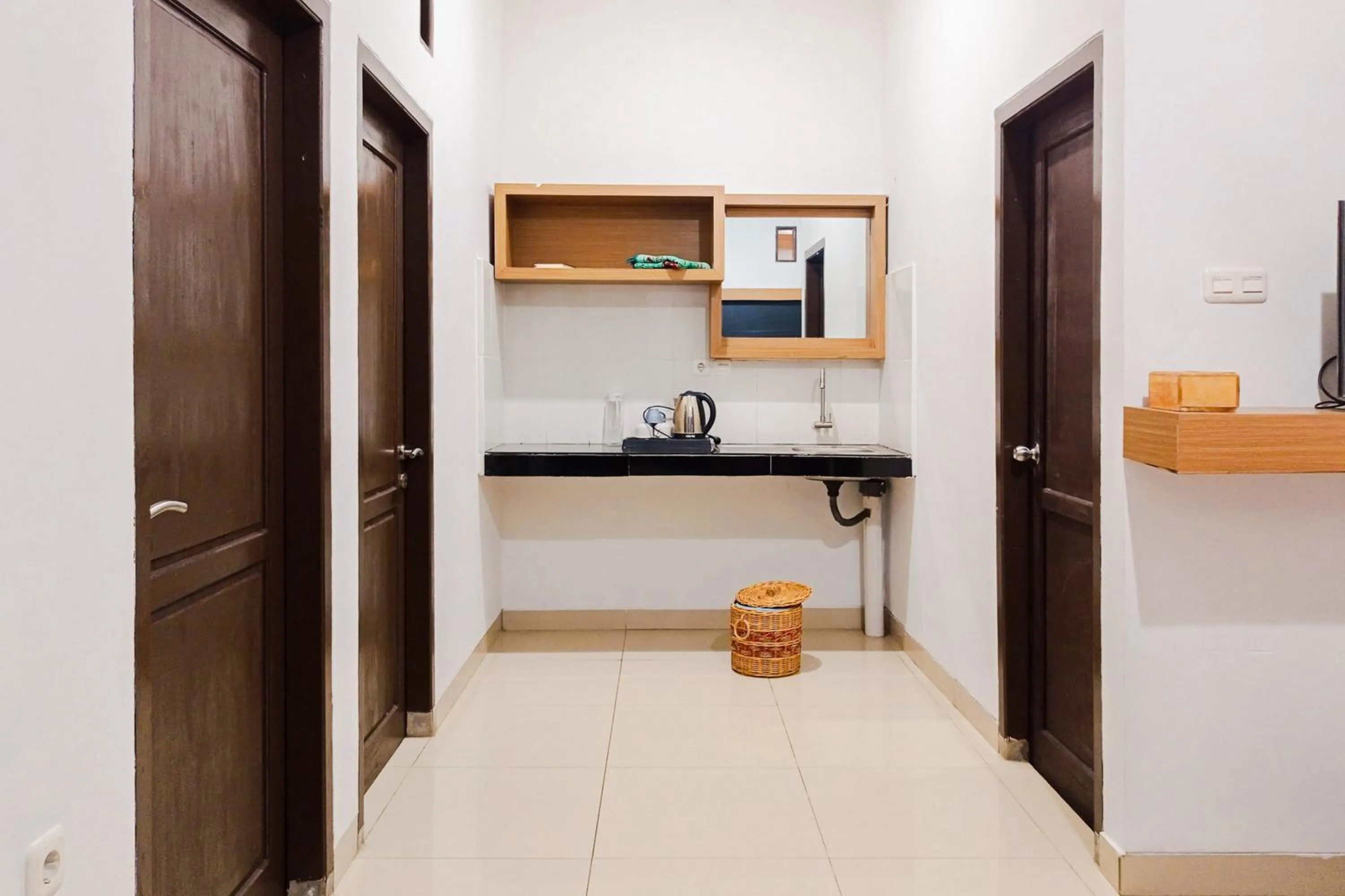 Bedroom in RedDoorz Syariah at Kiapma Hotel