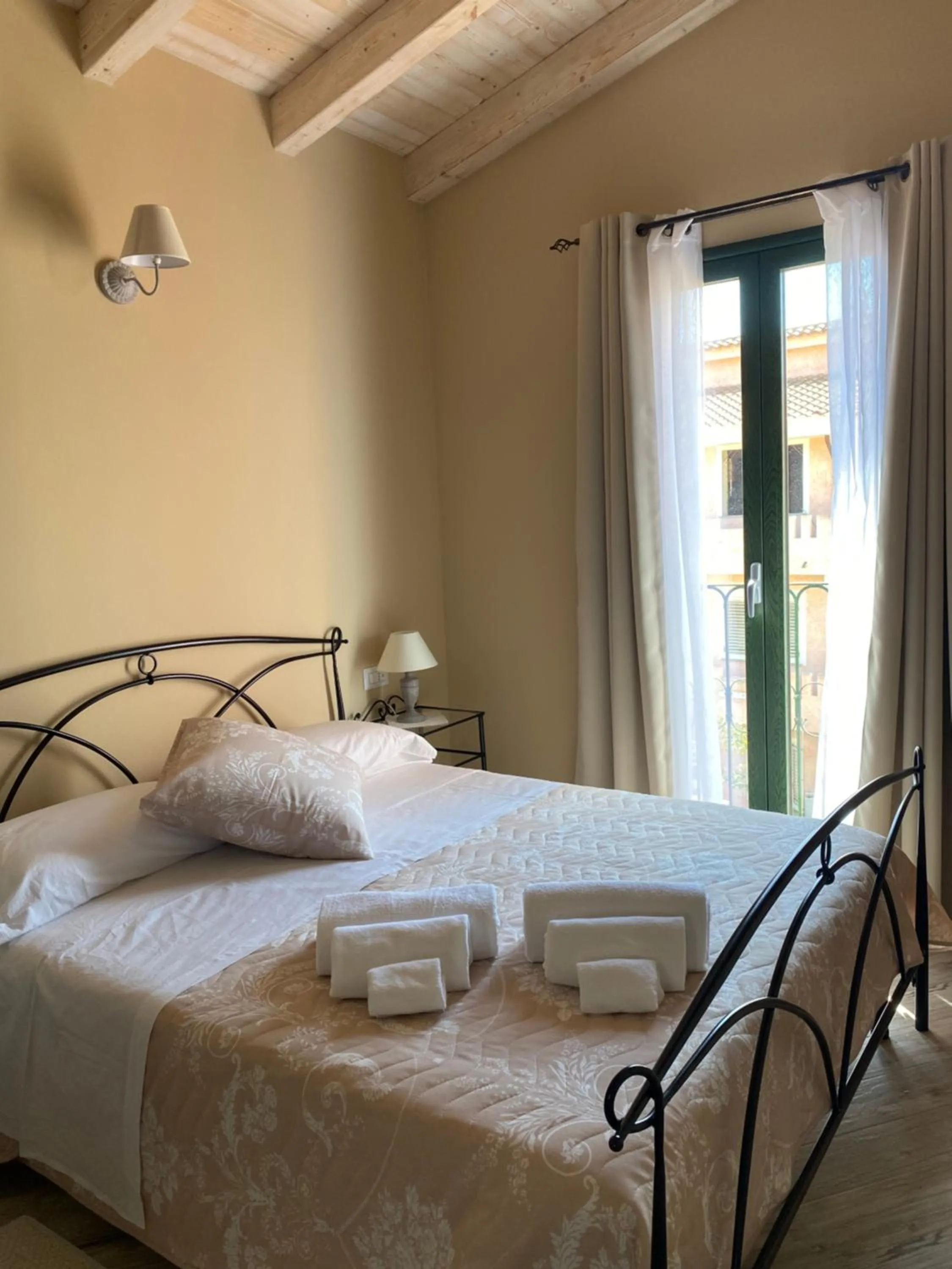 Bed in La Soffitta di EmmaSofia