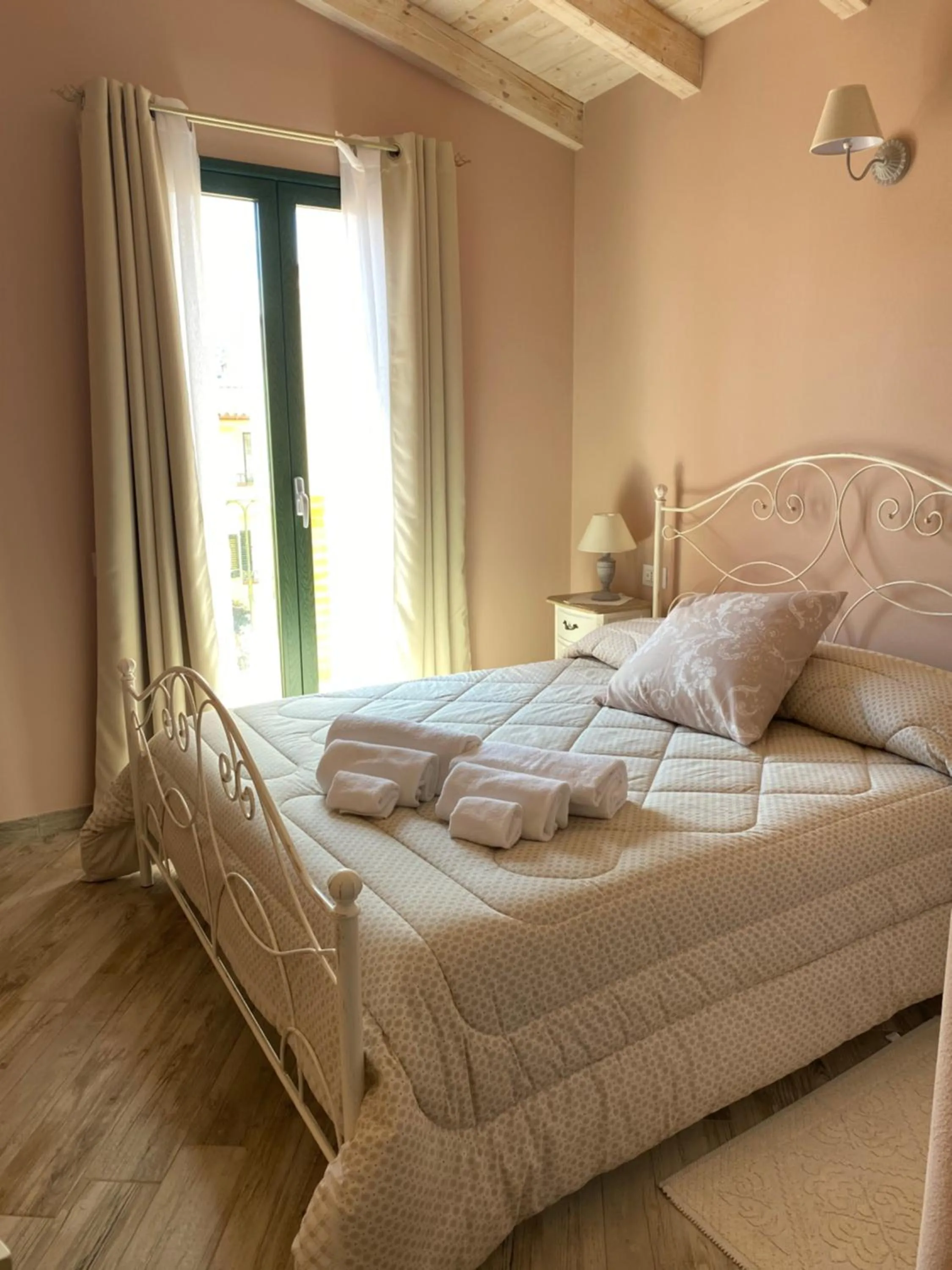 Bed in La Soffitta di EmmaSofia