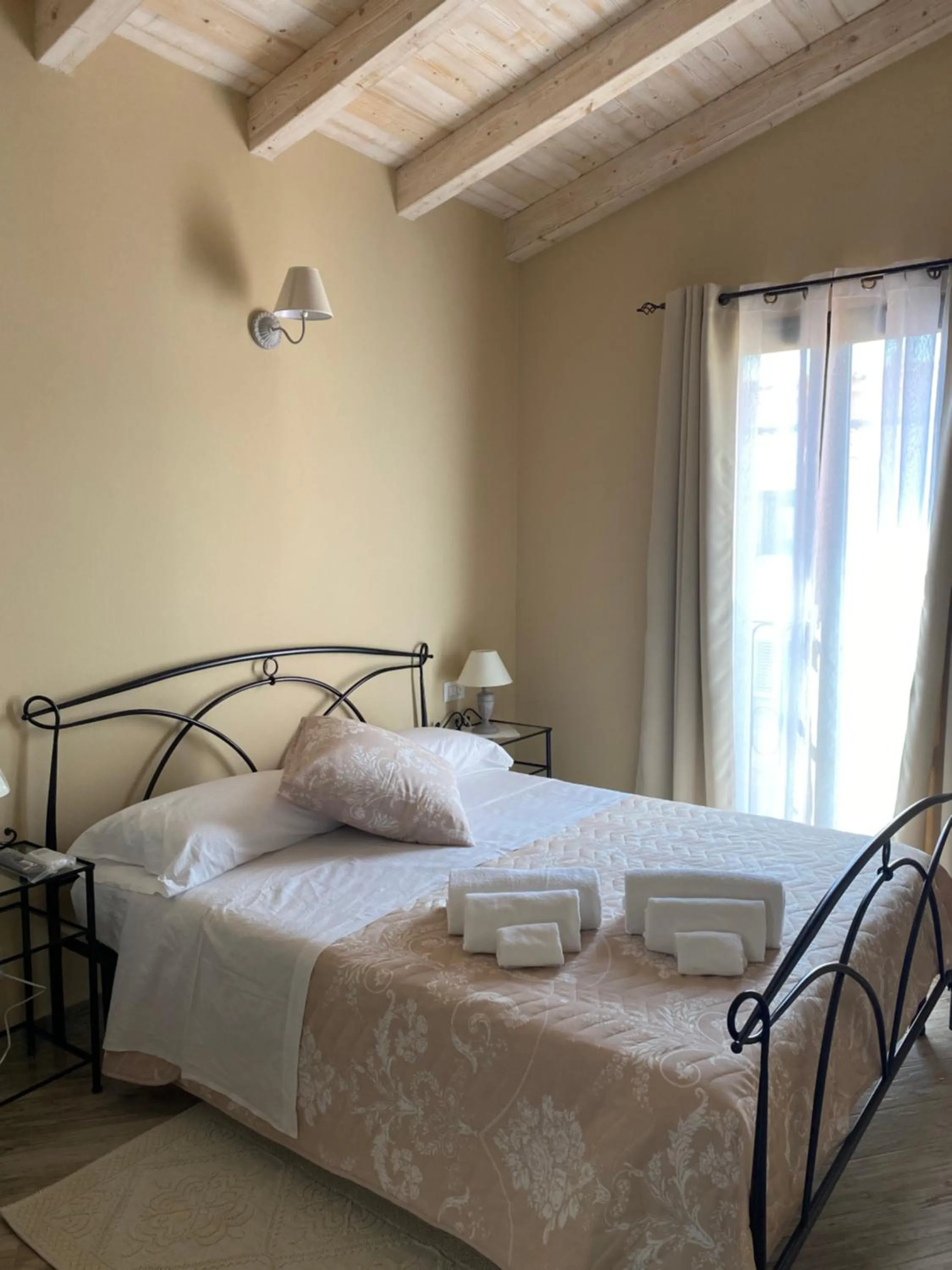 Bed in La Soffitta di EmmaSofia