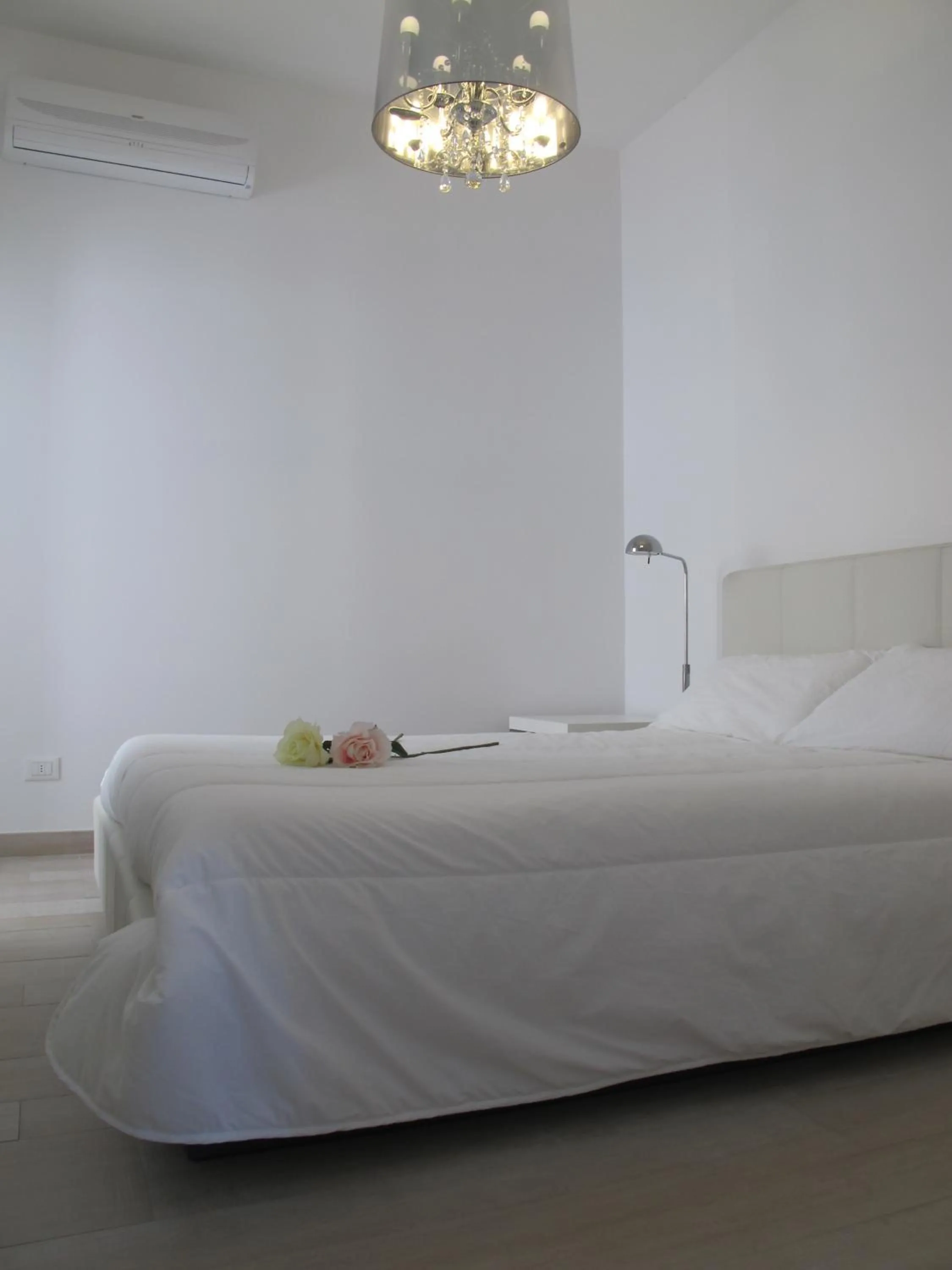 Bed in Penthouse Santa Croce