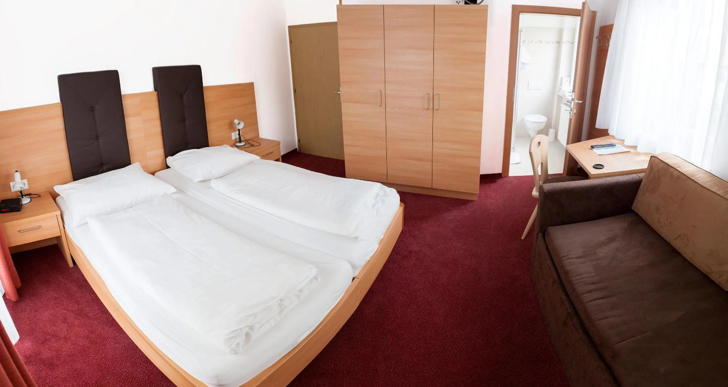 Photo of the whole room, Bed in Gasthaus Abram