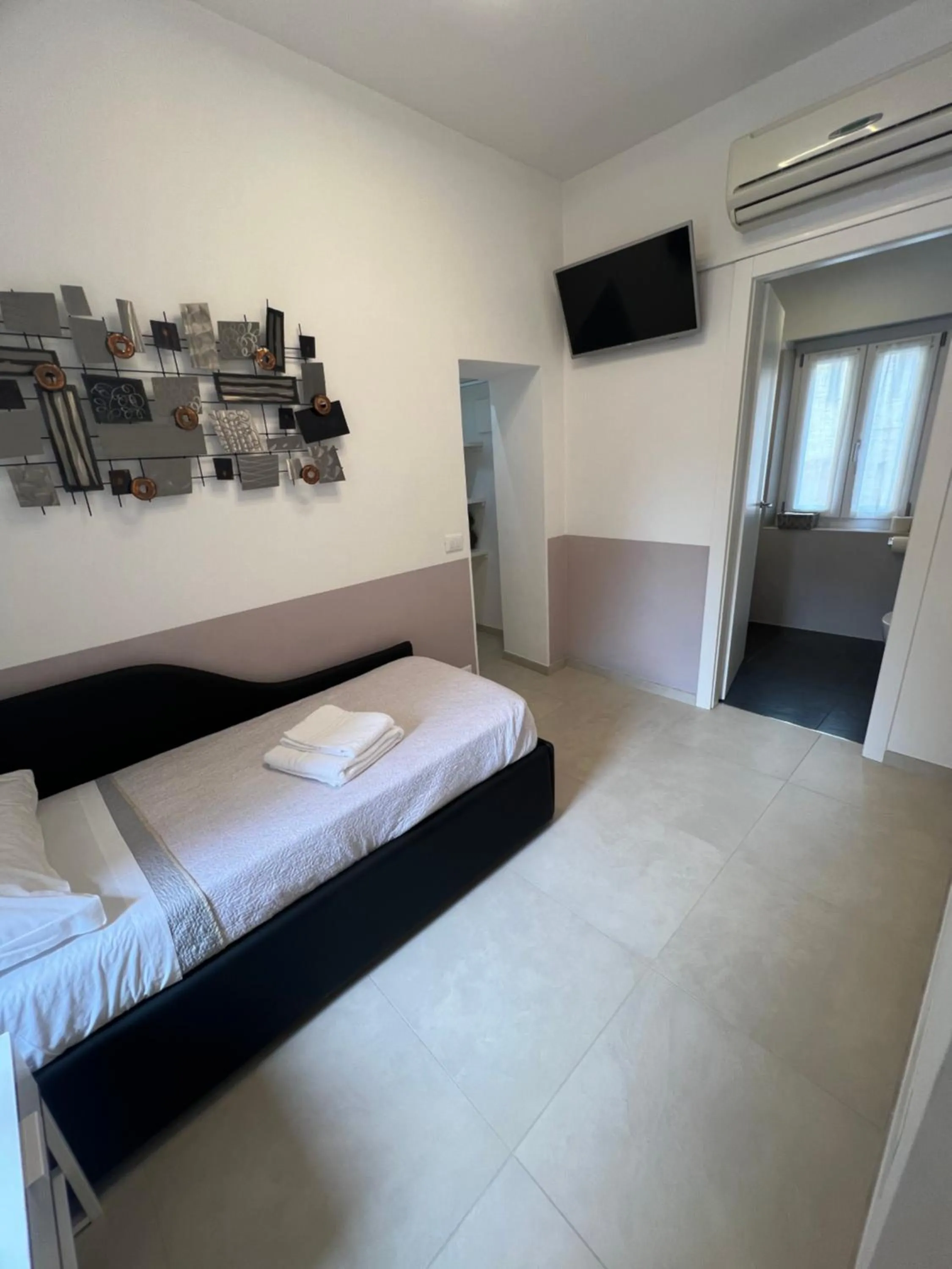 Bed in Affittacamere Sull'Arco