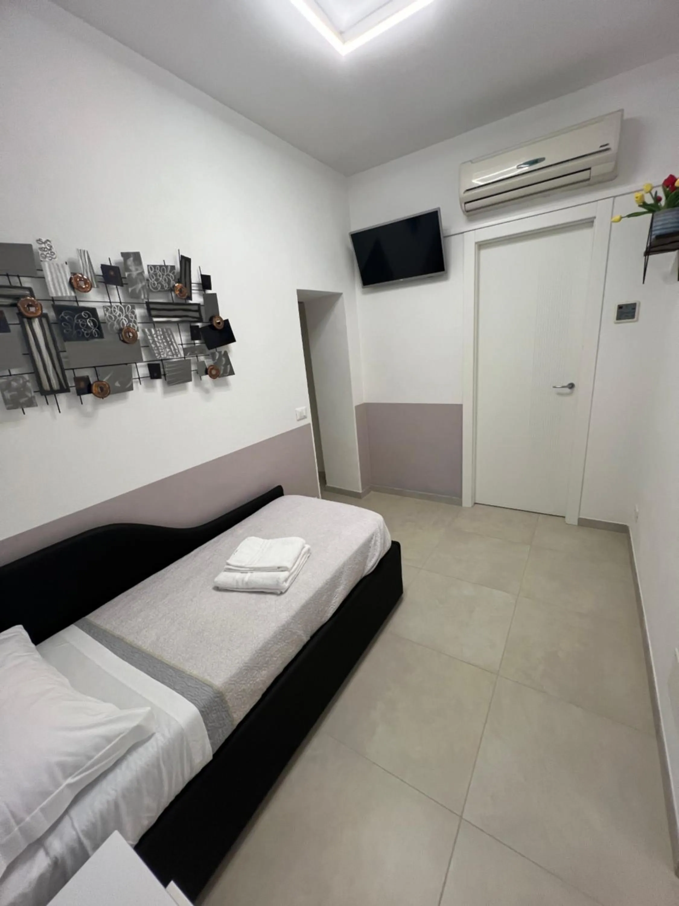 Bed in Affittacamere Sull'Arco