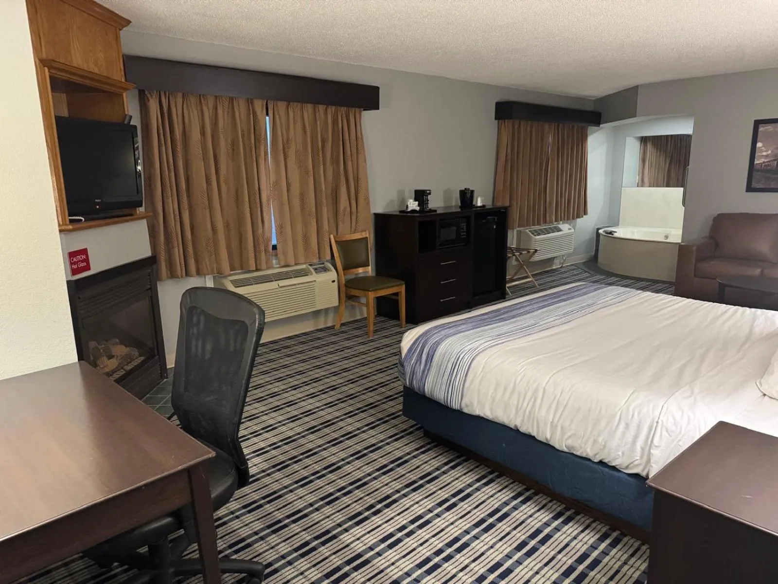 Bedroom, Bed in AmericInn by Wyndham Ames