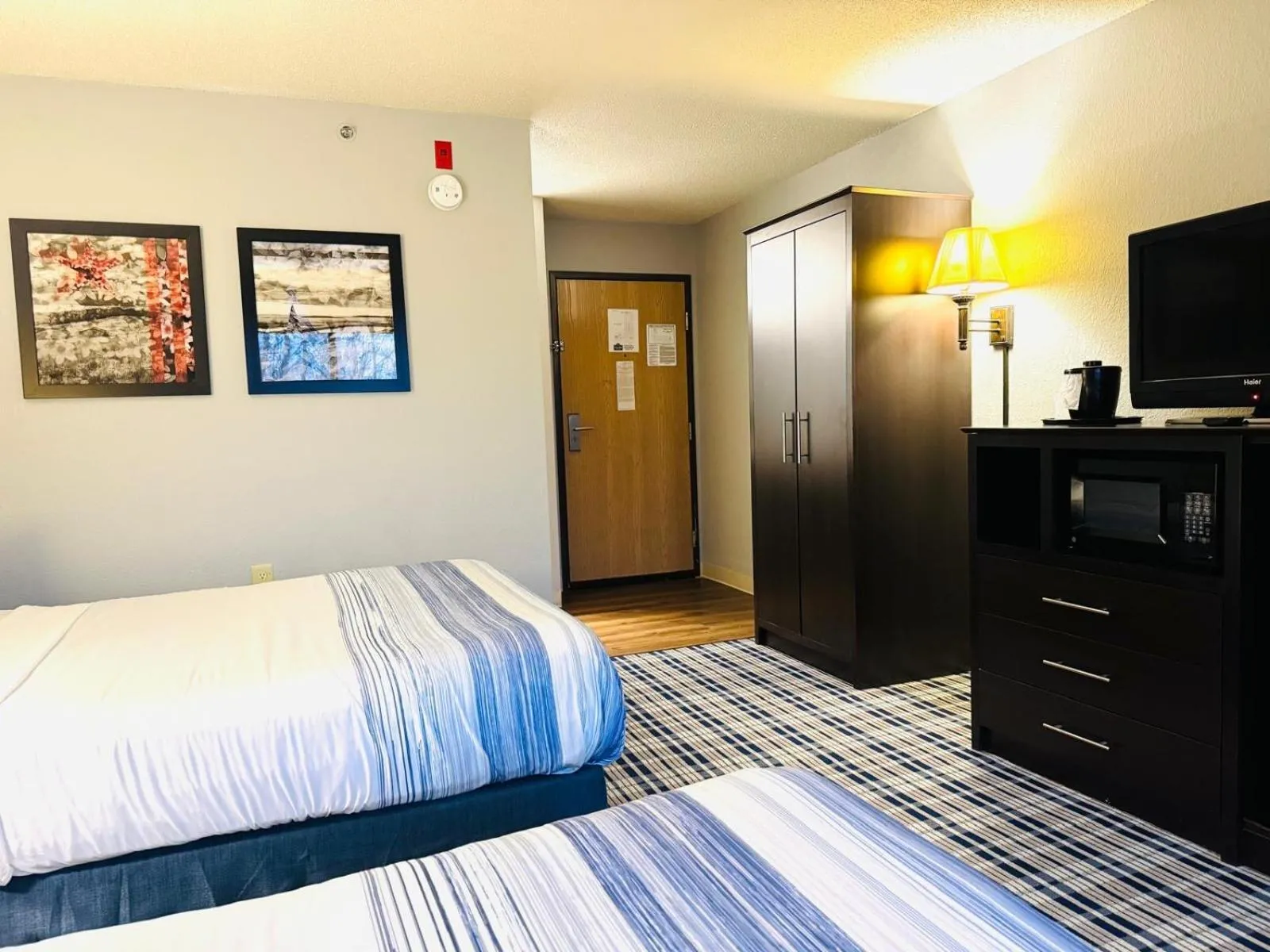 Bedroom, Bed in AmericInn by Wyndham Ames