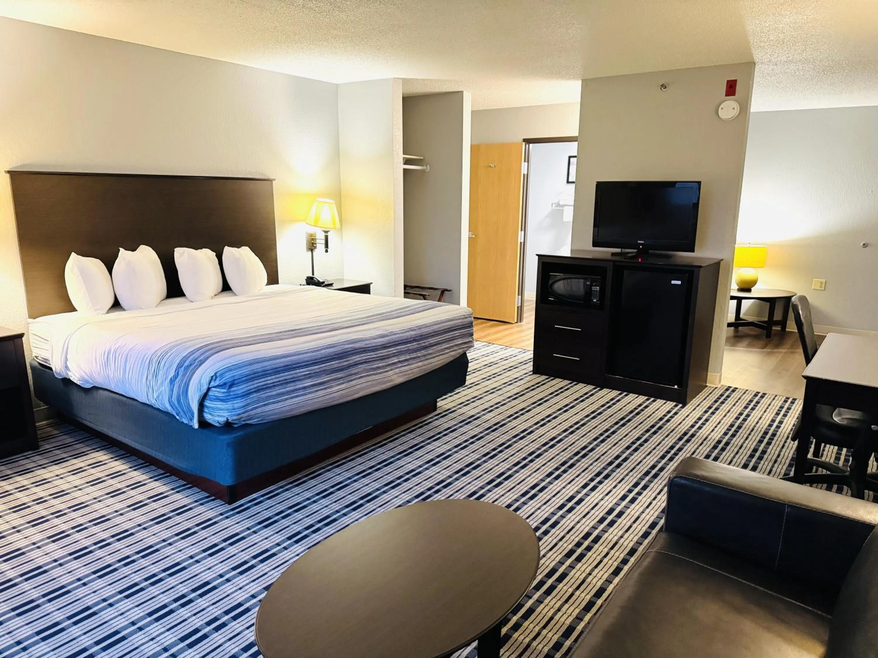 Bedroom, Bed in AmericInn by Wyndham Ames