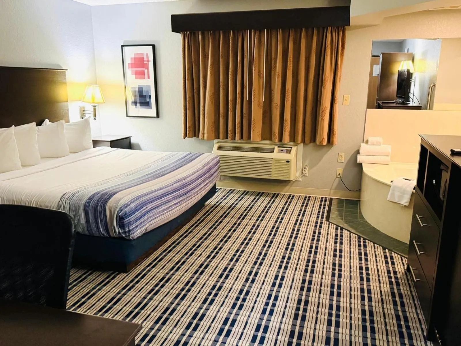 Bedroom, Bed in AmericInn by Wyndham Ames