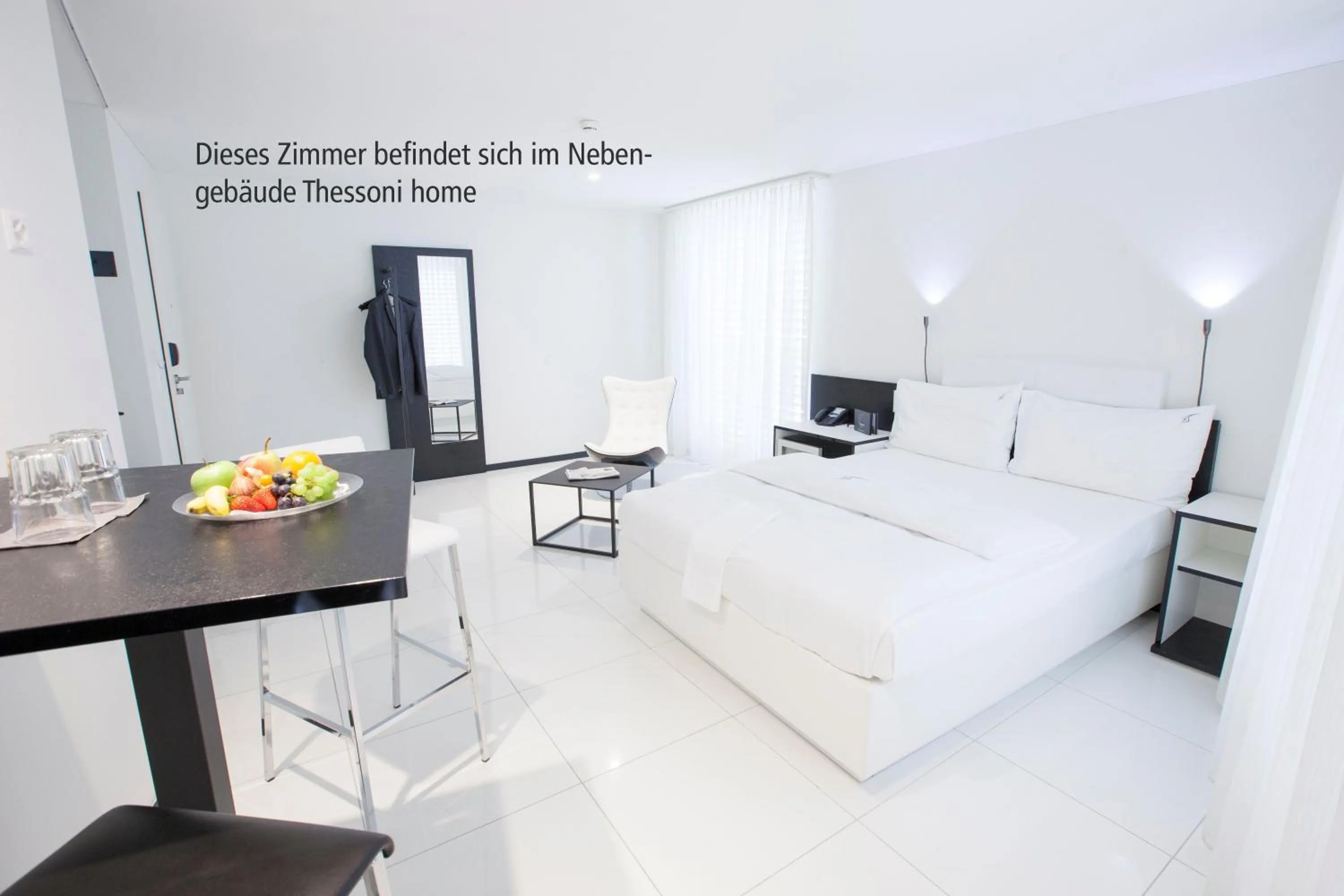 Photo of the whole room, Bed in Boutiquehotel Thessoni Classic & Self service Residence Home Zürich