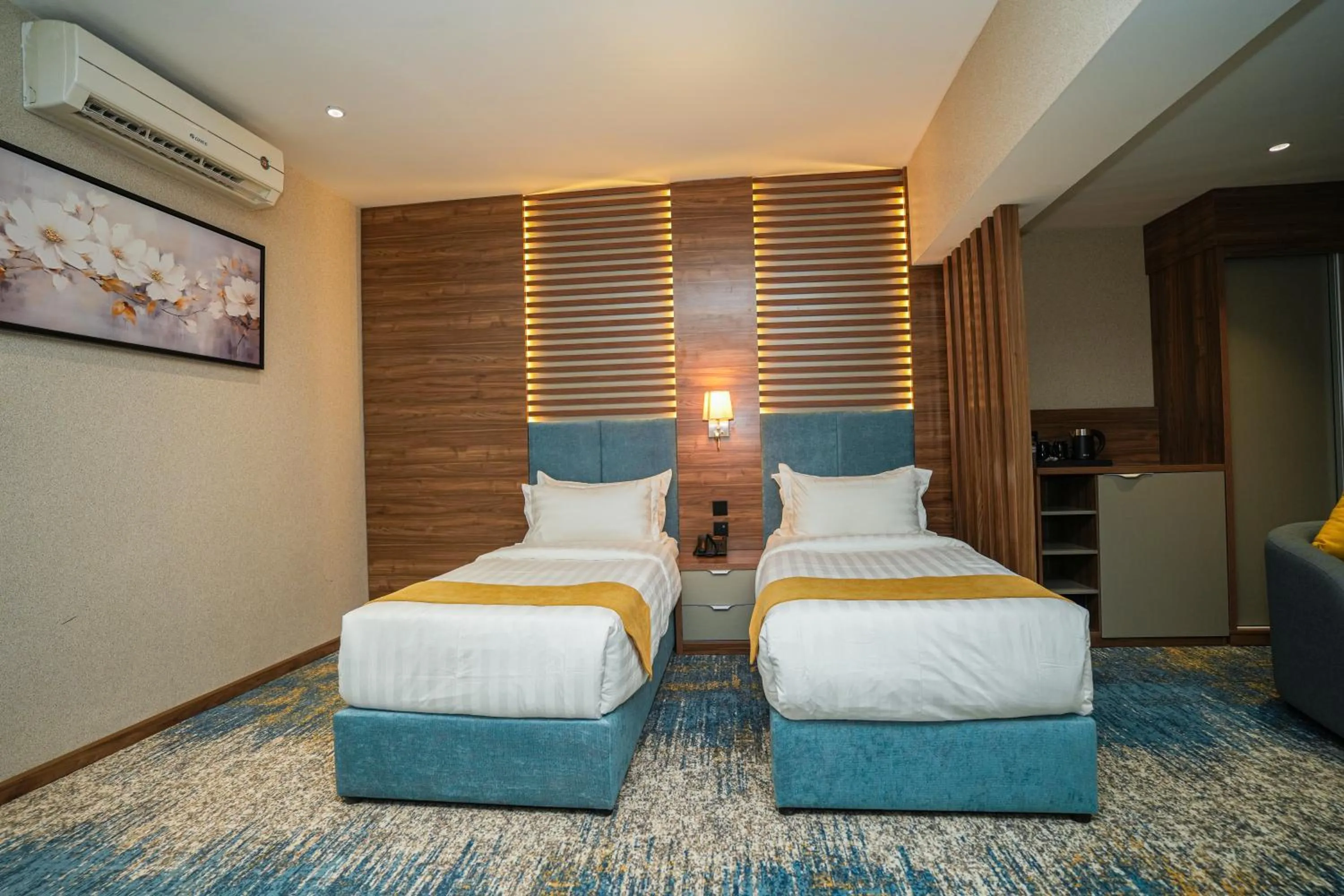 Bed in Almsakn Alola Hotel Company