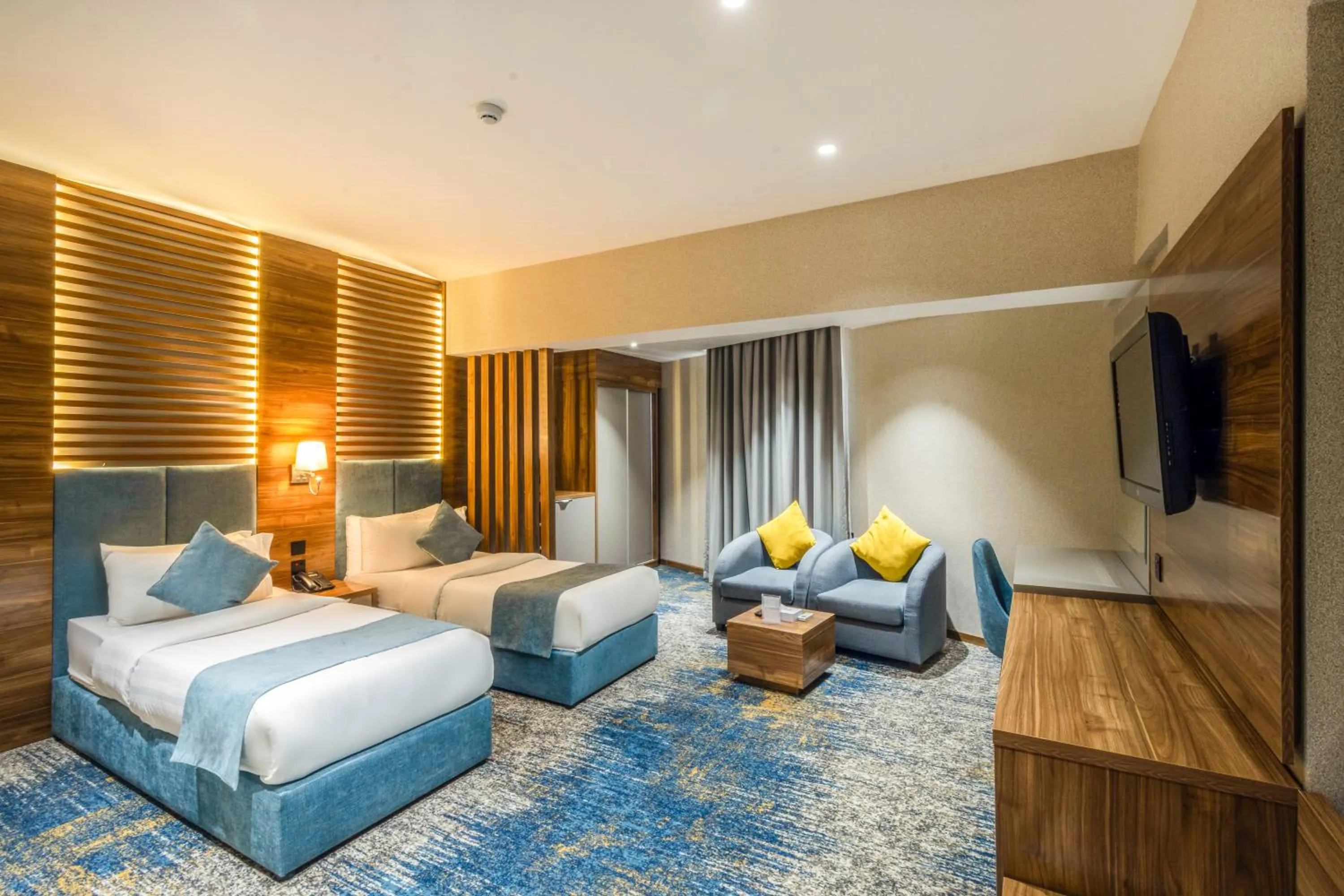 Bed in Almsakn Alola Hotel Company