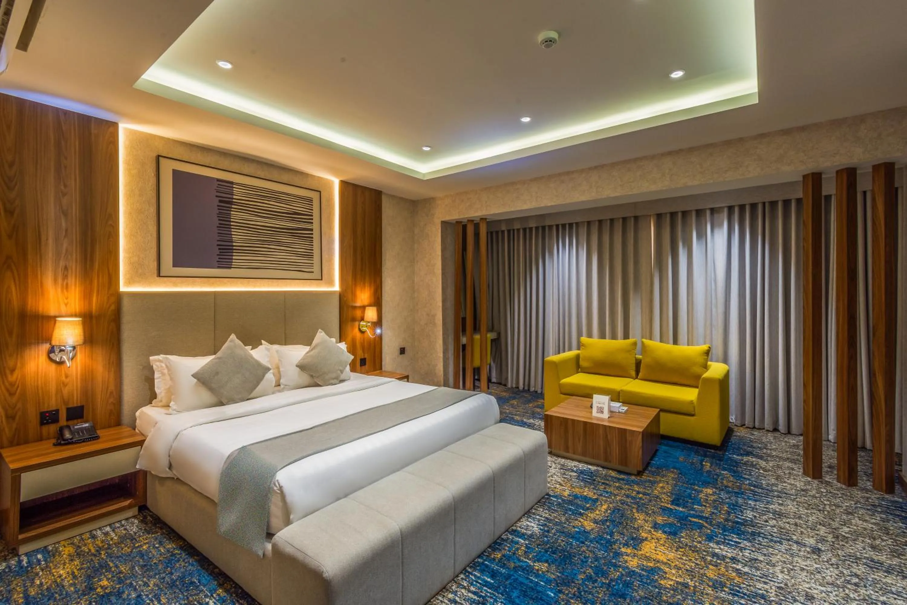 Bed in Almsakn Alola Hotel Company