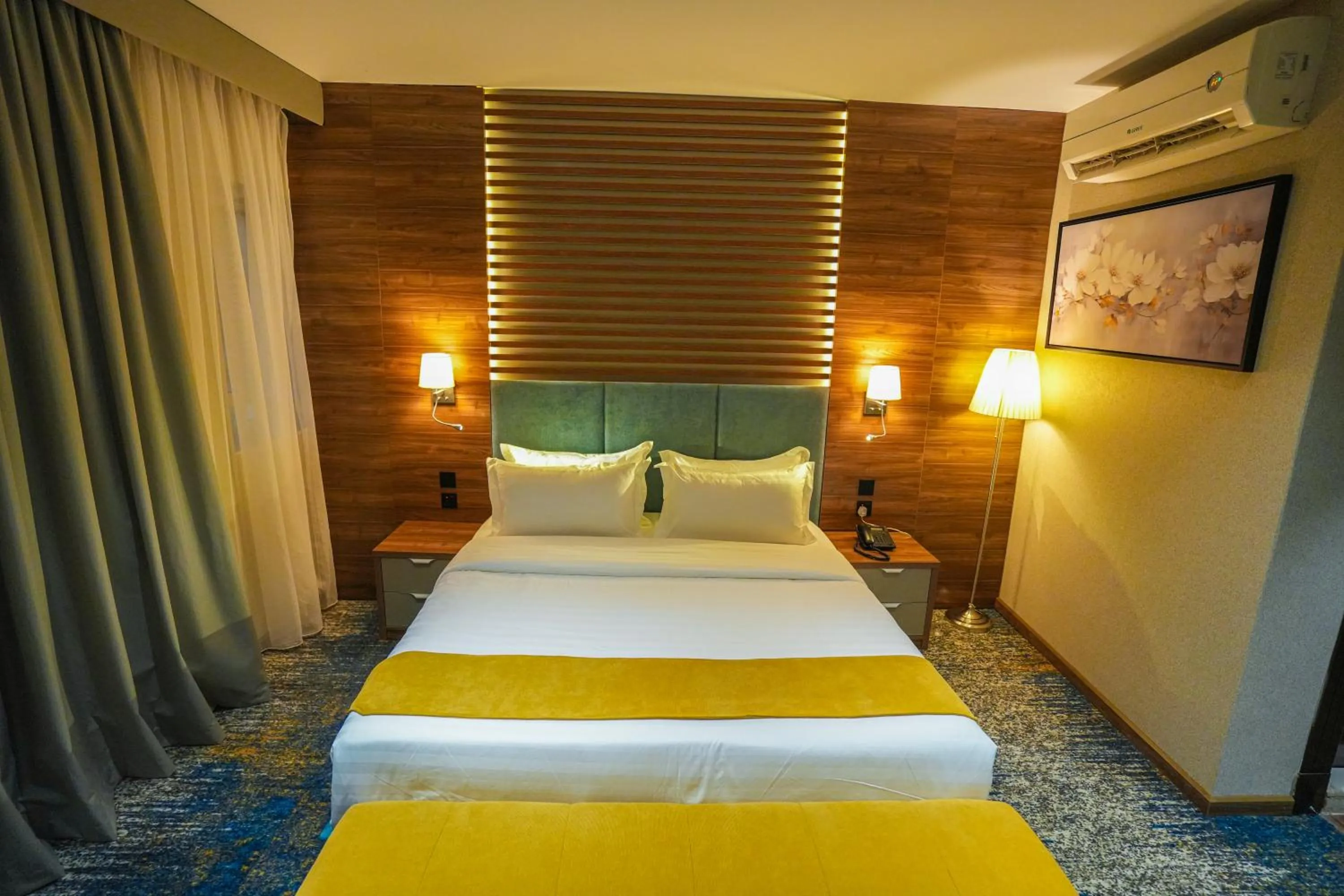 Bed in Almsakn Alola Hotel Company