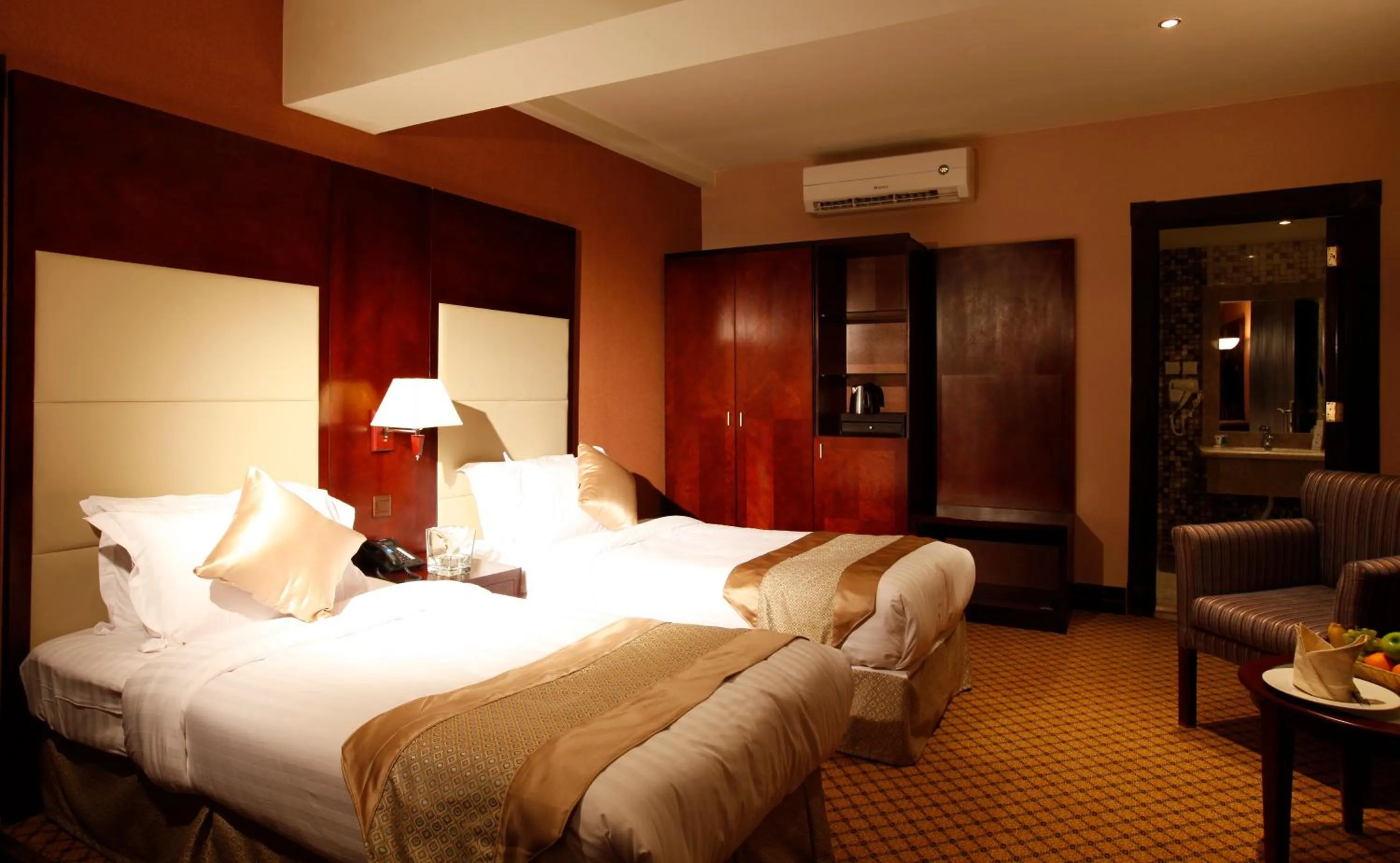 Bed in Almsakn Alola Hotel Company