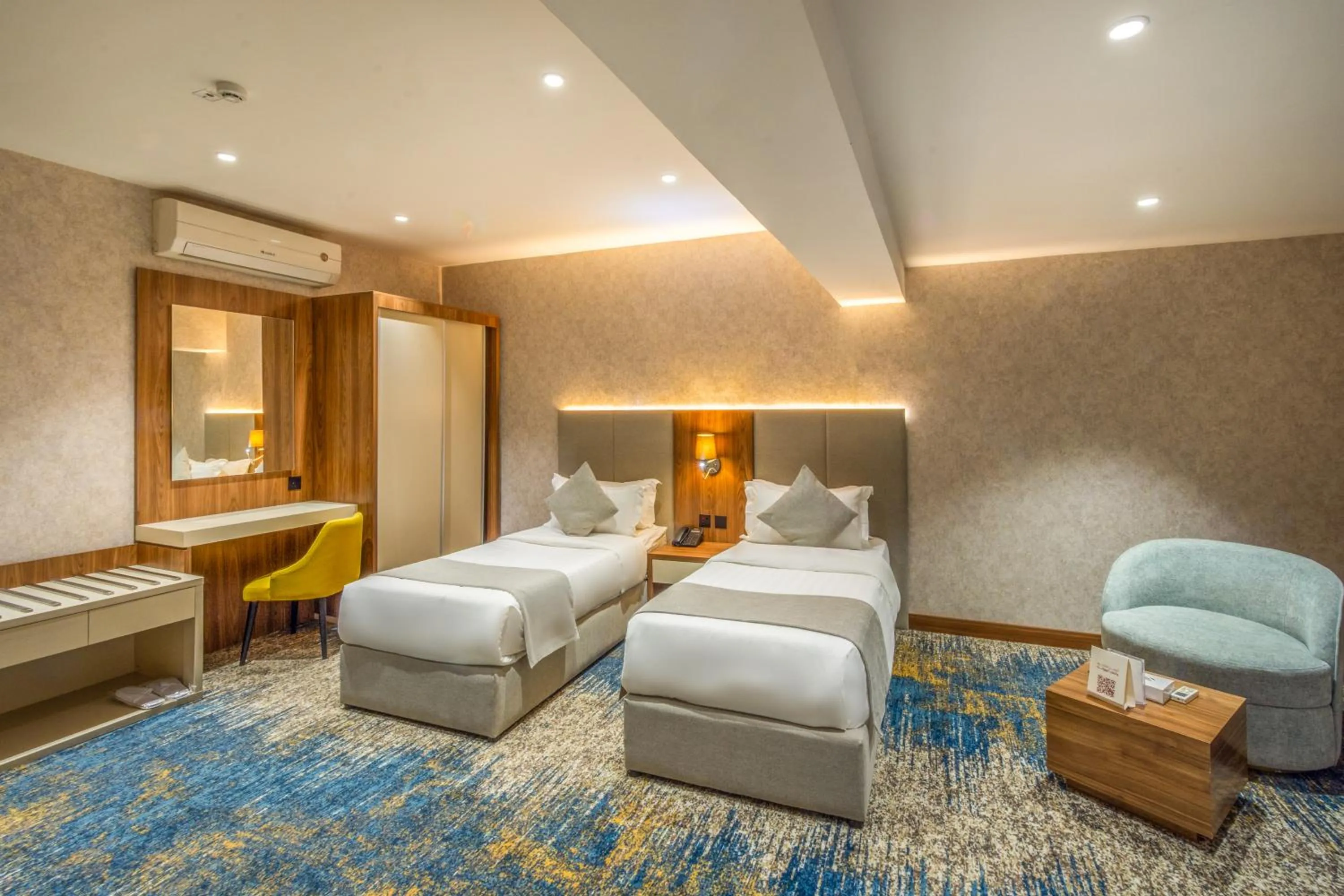 Bed in Almsakn Alola Hotel Company