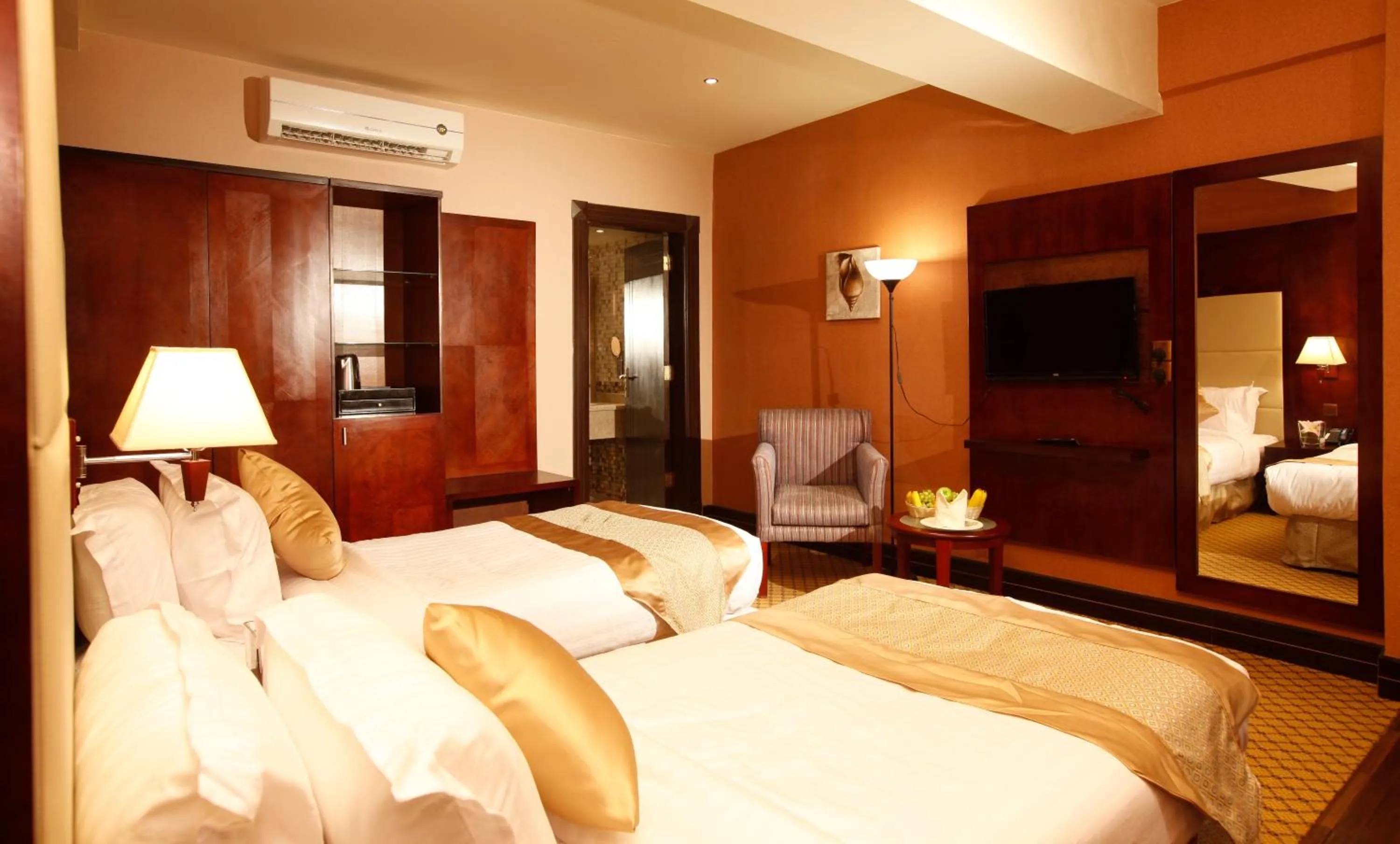 Bed in Almsakn Alola Hotel Company