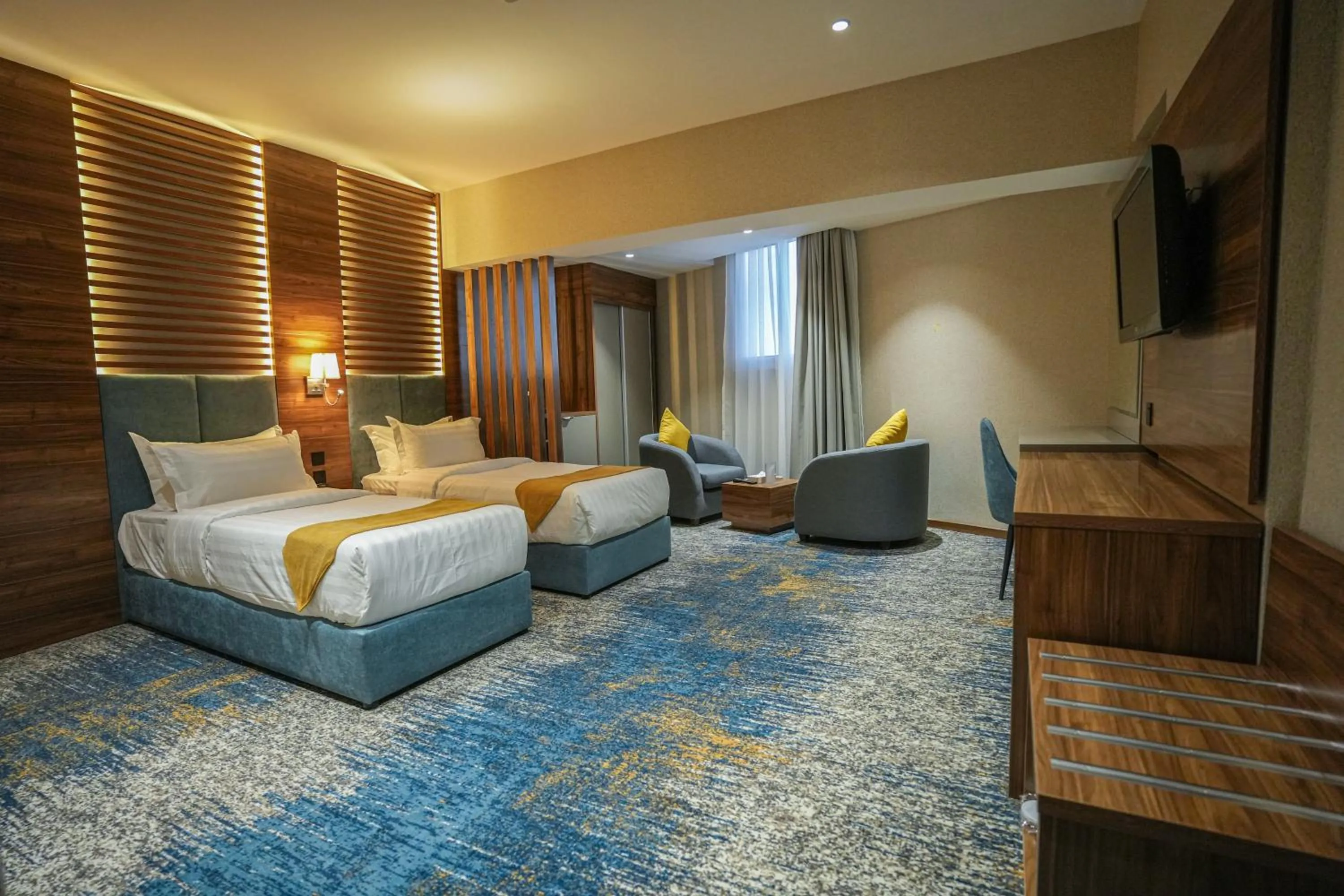 Bed in Almsakn Alola Hotel Company