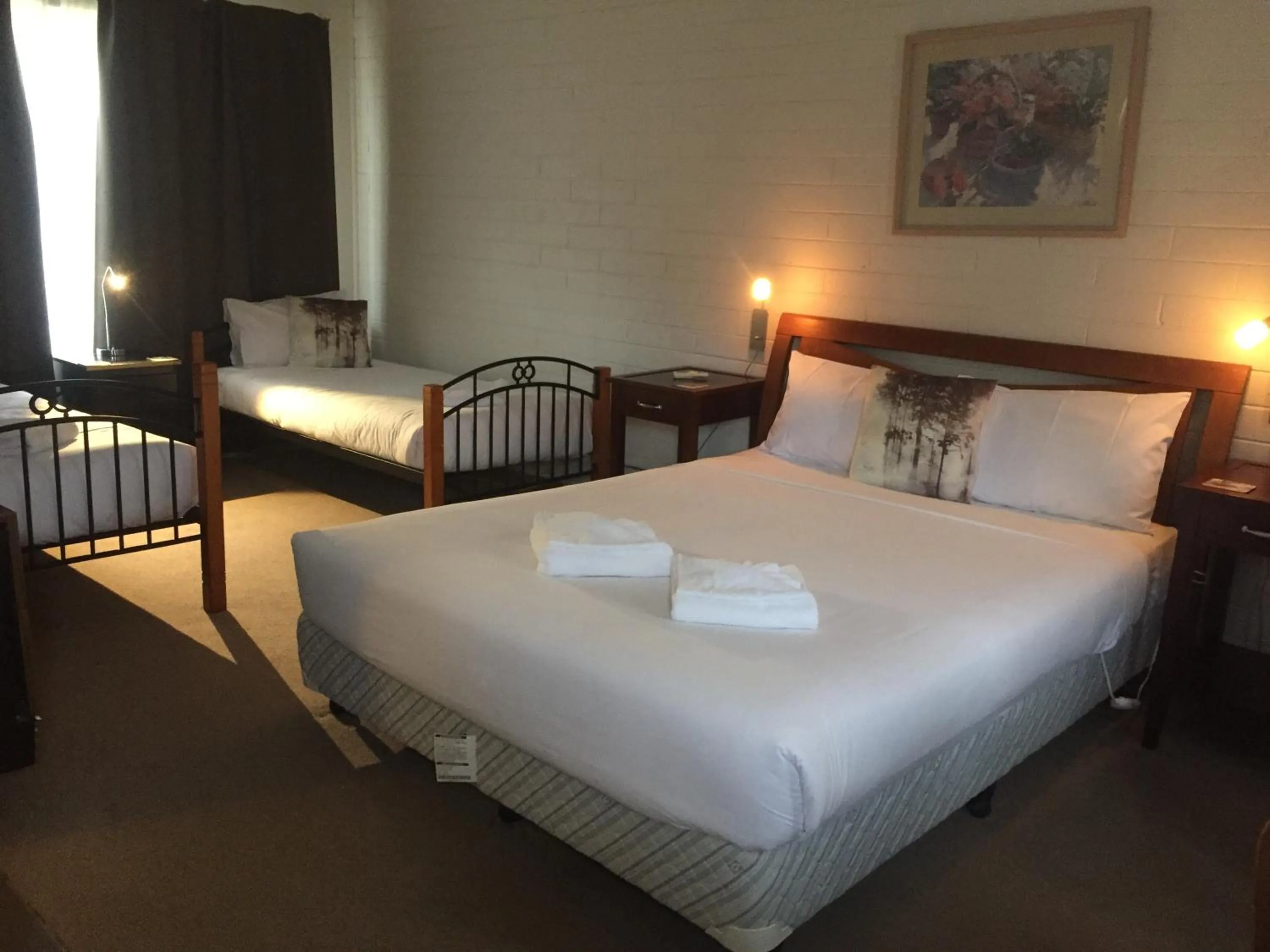 Bedroom, Bed in Buffalo Motel and Country Retreat