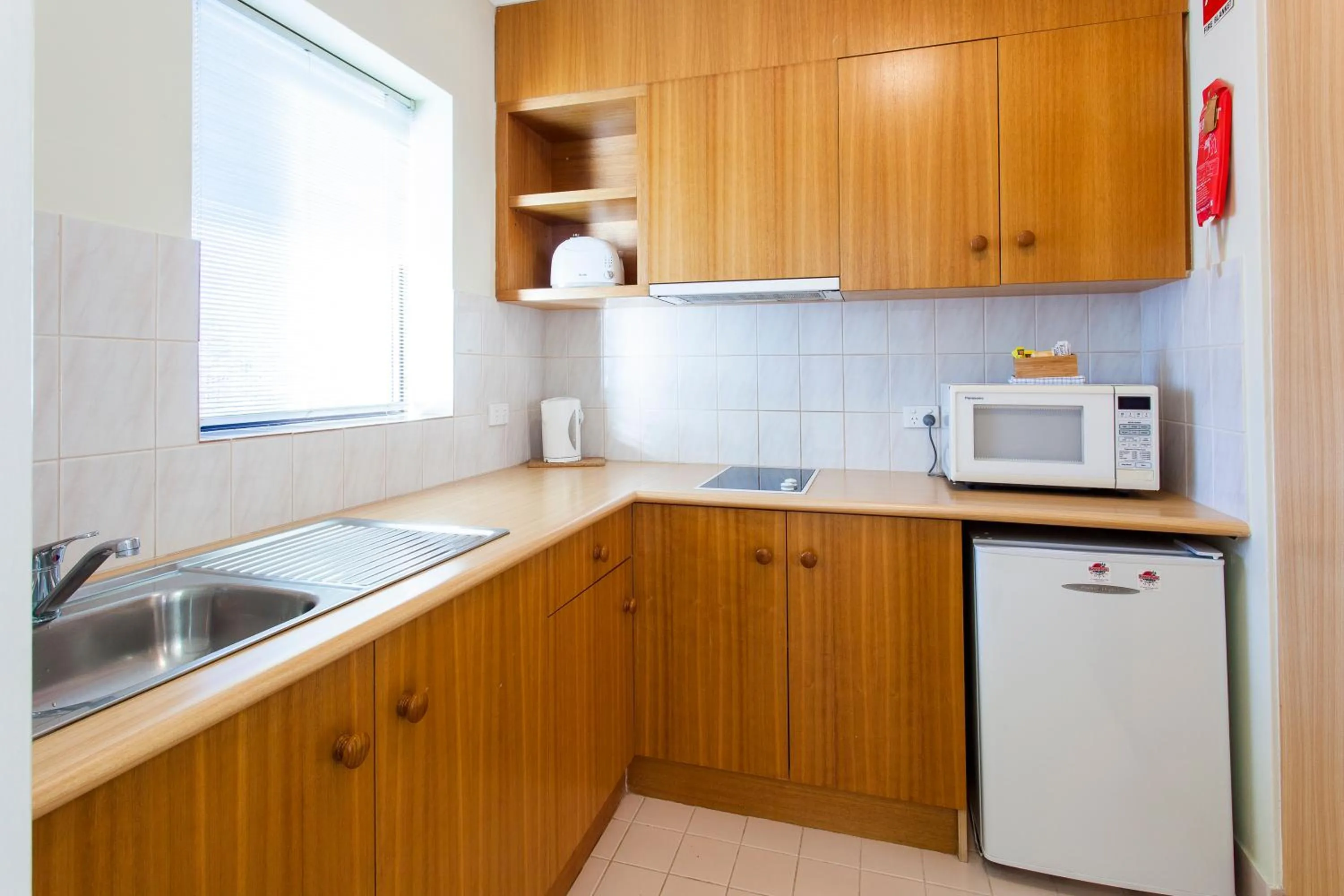Kitchen or kitchenette in Kings Park Motel