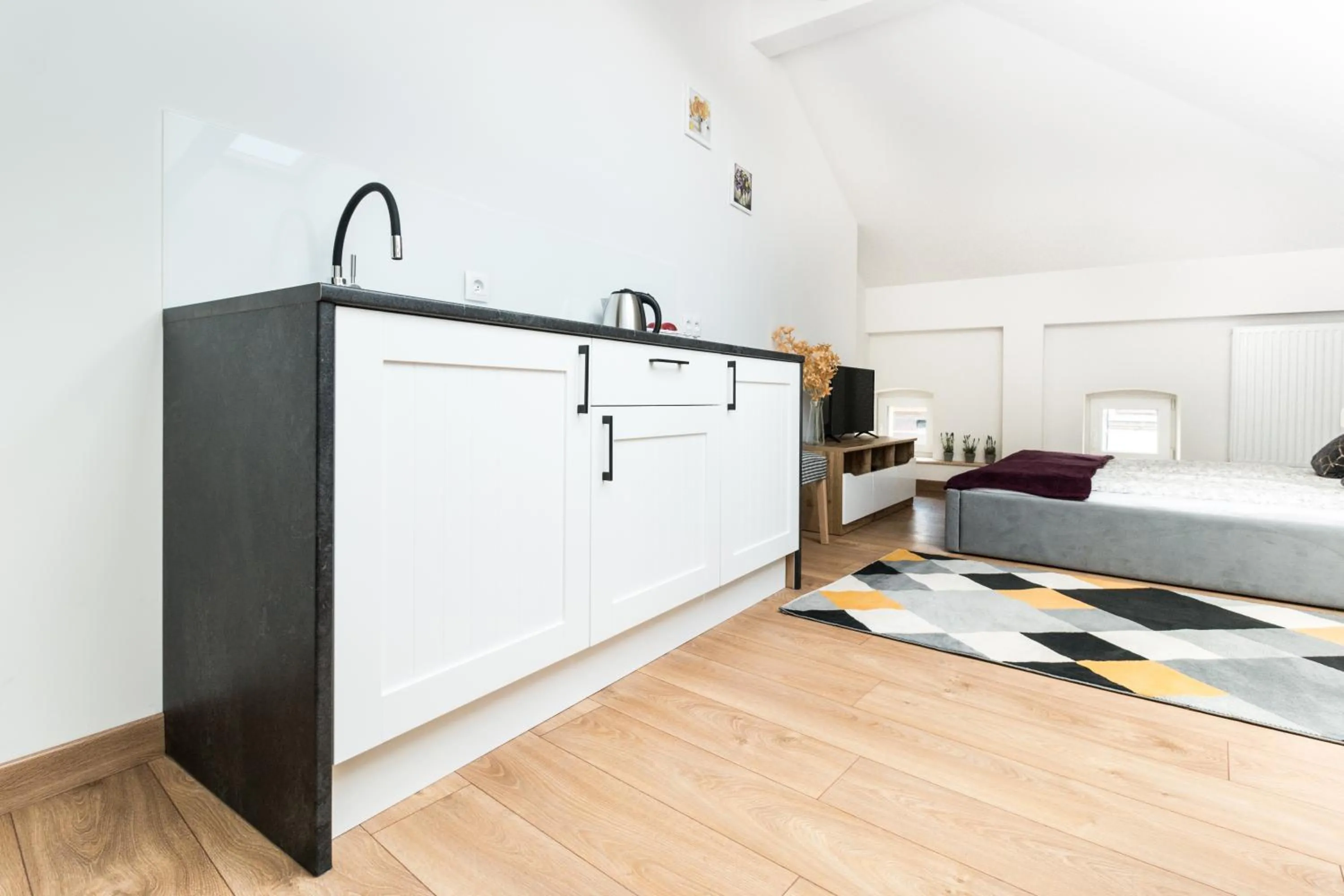 Kitchen or kitchenette, Bed in Dluga Apartments
