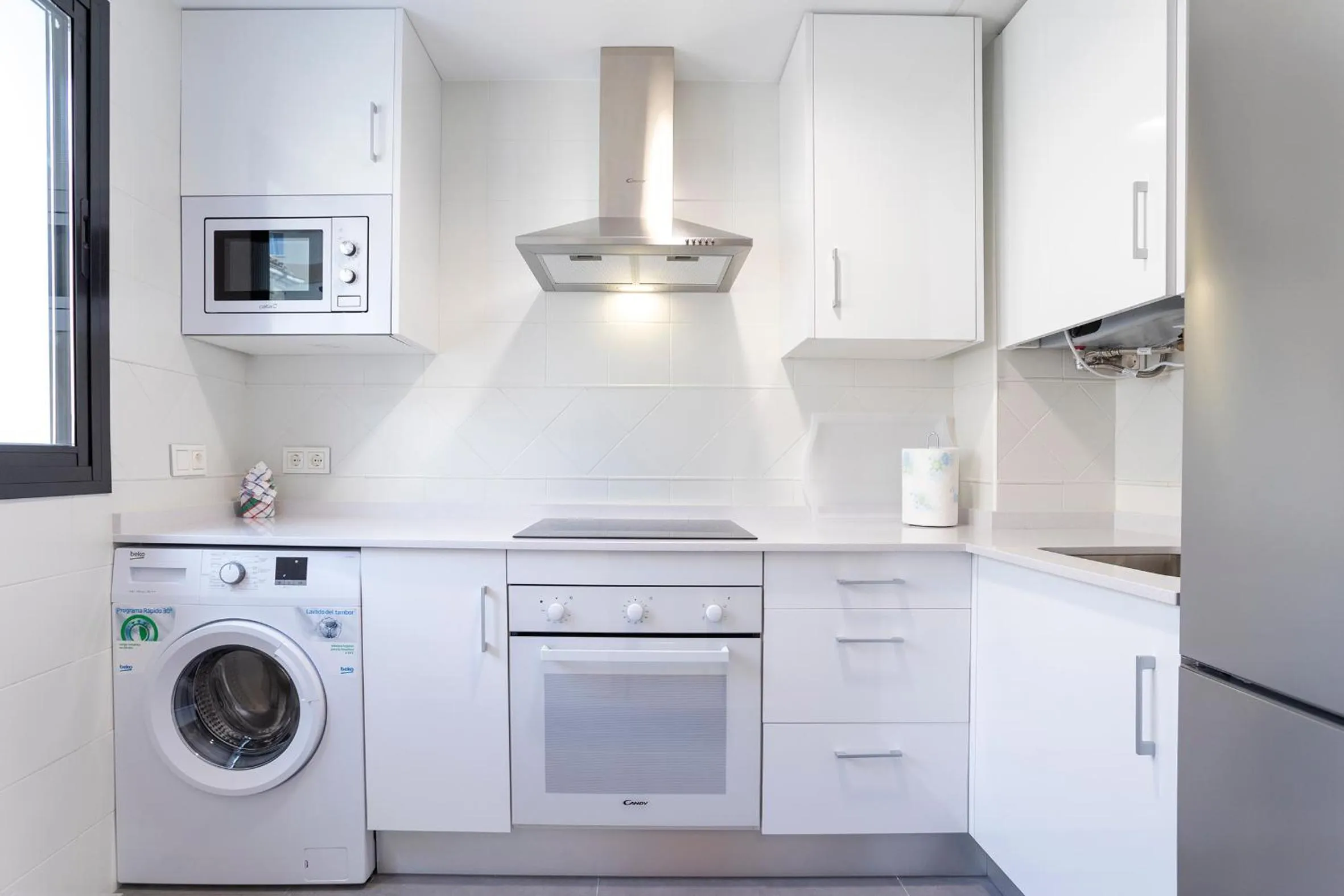 Kitchen or kitchenette in Málaga Rivas 34 Suites Homes