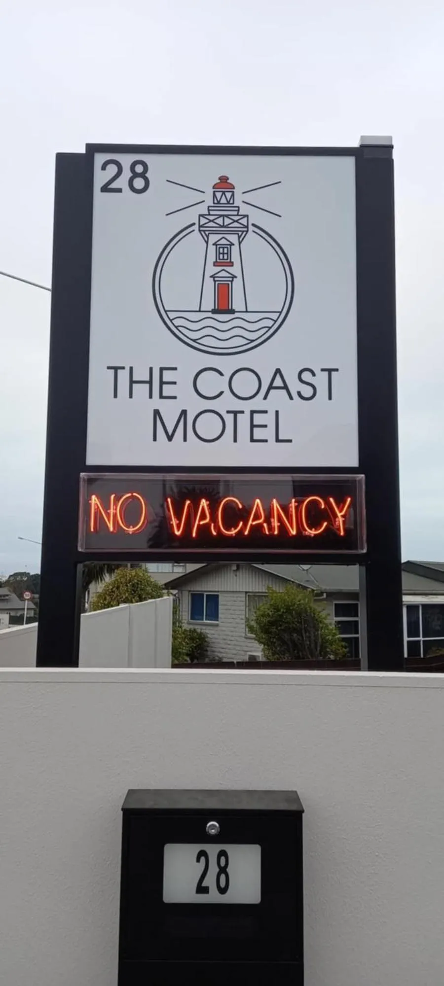 Property logo or sign in The Coast Motel