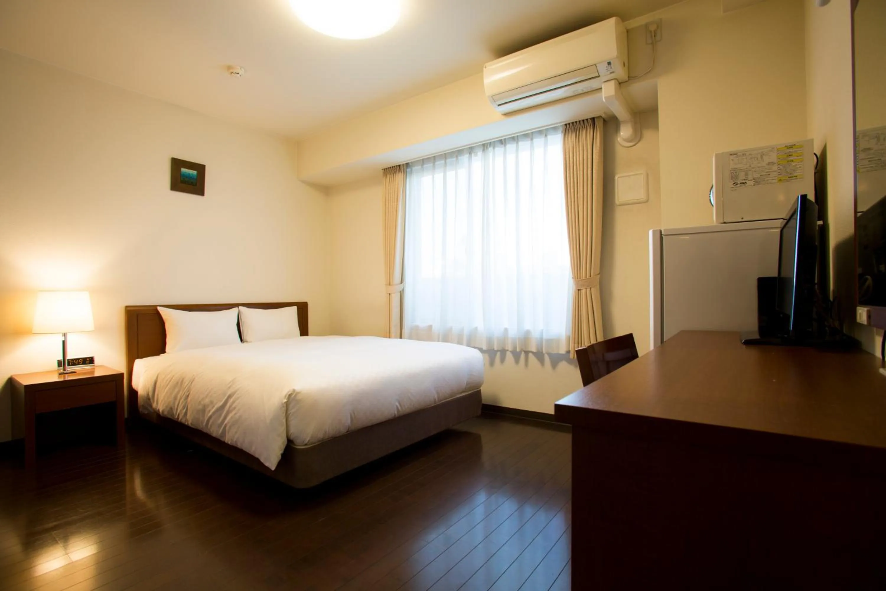 Bed in Hotel Hakata Place